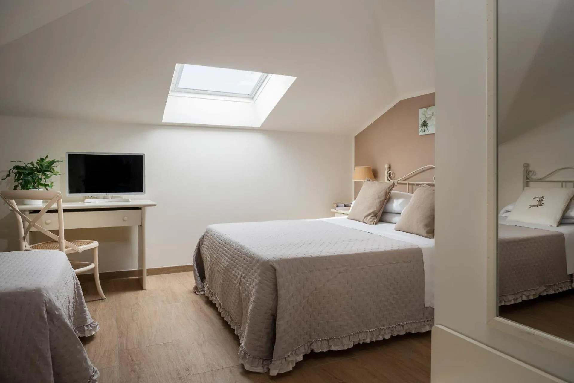 Bed in Hotel Giardino Suites&Spa