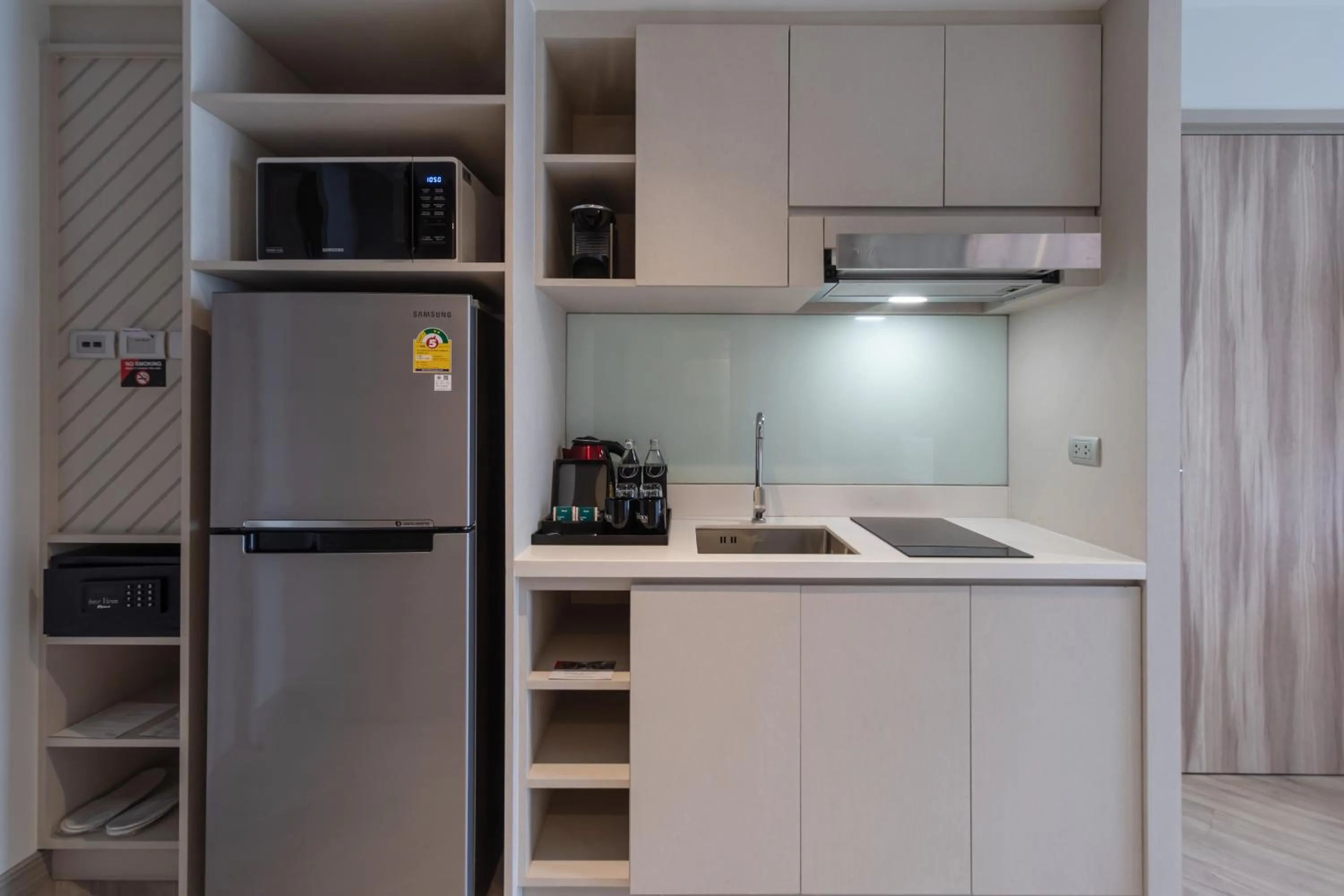Kitchen or kitchenette in Oakwood Studios Sukhumvit Bangkok