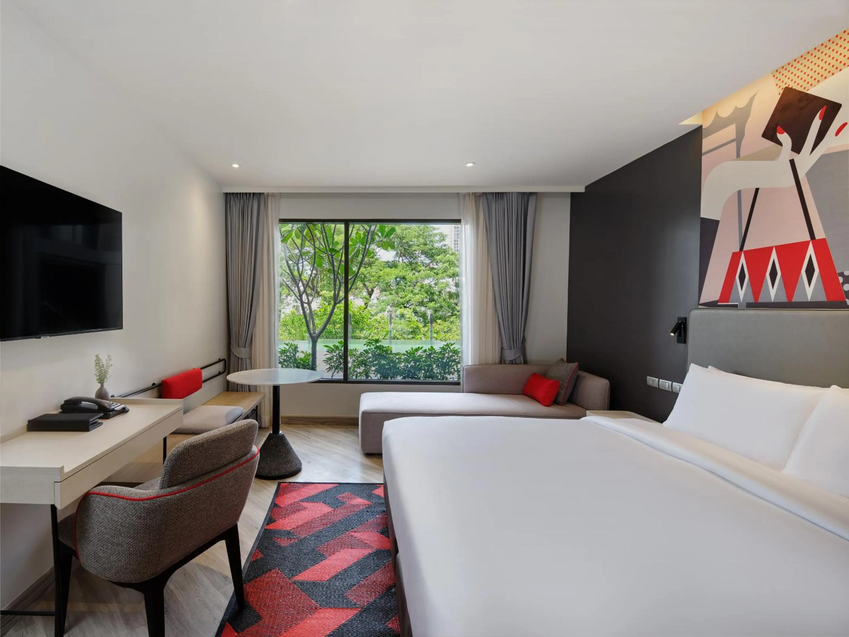 Photo of the whole room, Bed in Oakwood Studios Sukhumvit Bangkok