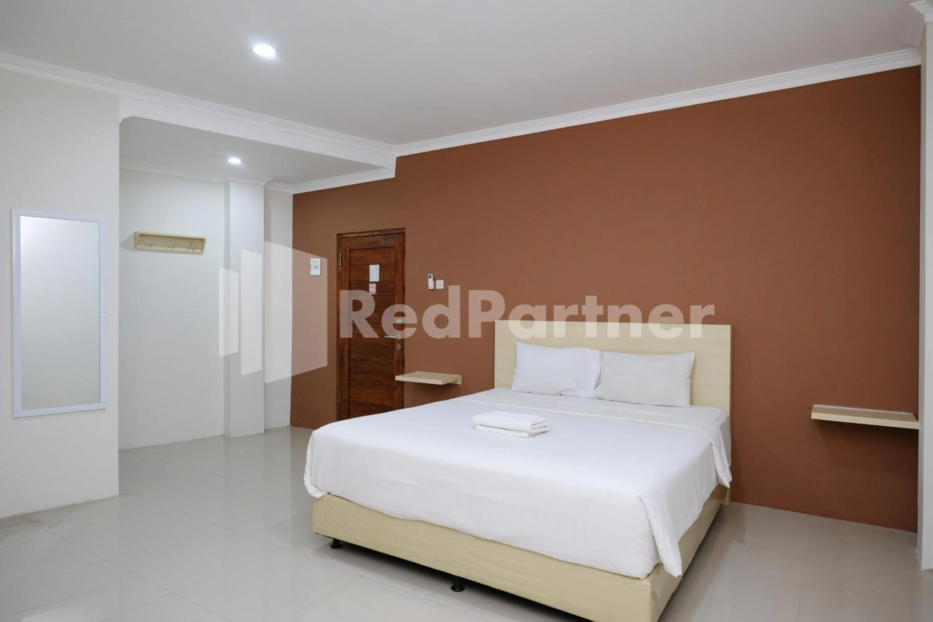 Bedroom, Bed in Hotel Andono near YIA Mitra RedDoorz