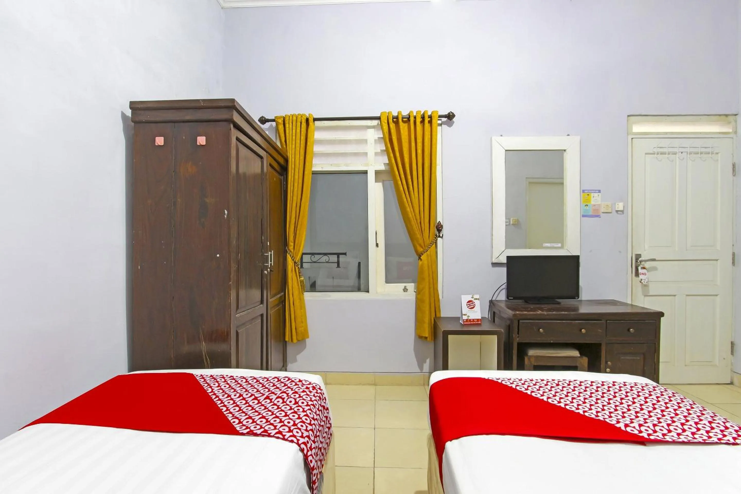 Bedroom, Bed in Hotel O Homestay Al Maidah
