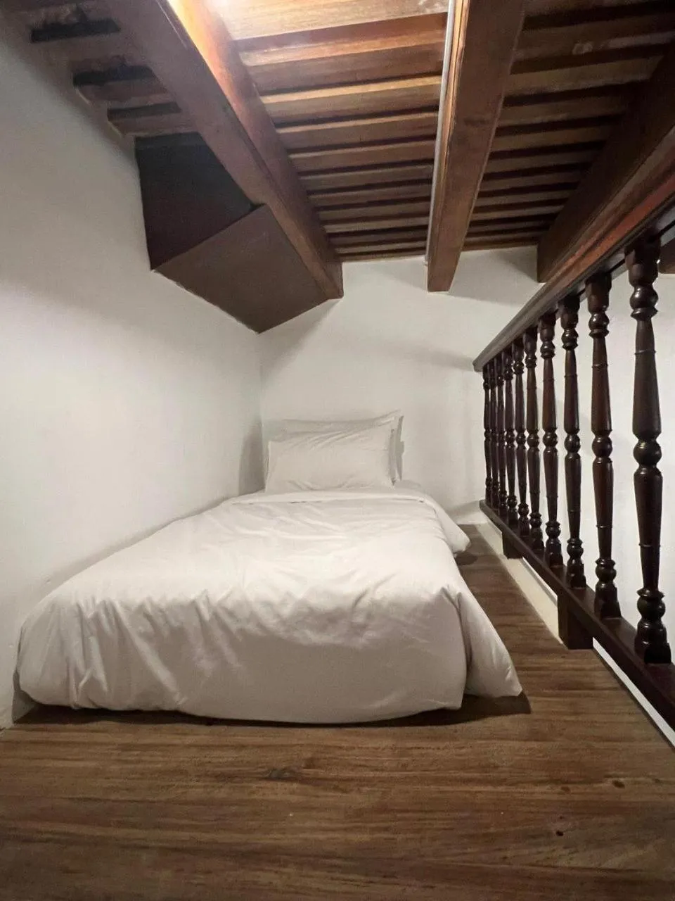 Bed in East Indies Mansion