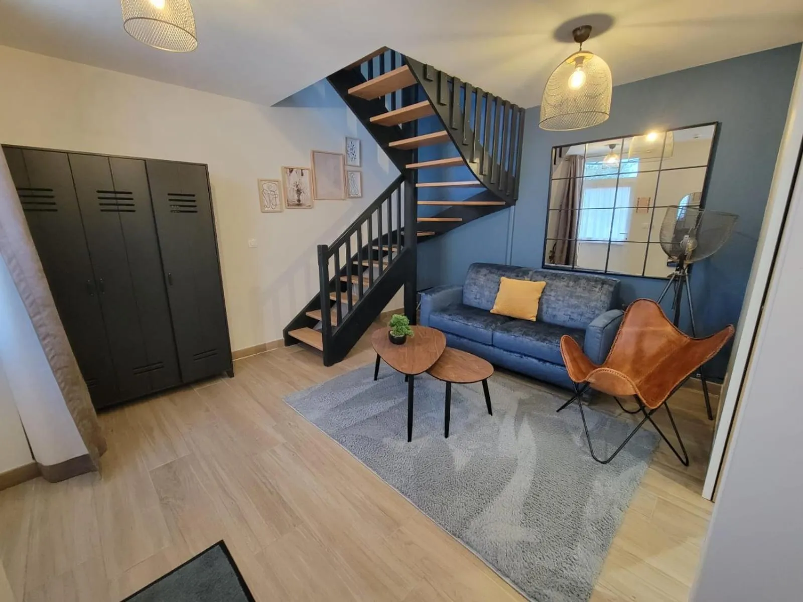 Living room in Hôtel Échappée en Baie - Parking privé gratuit dont forfaits bornes électriques réservable