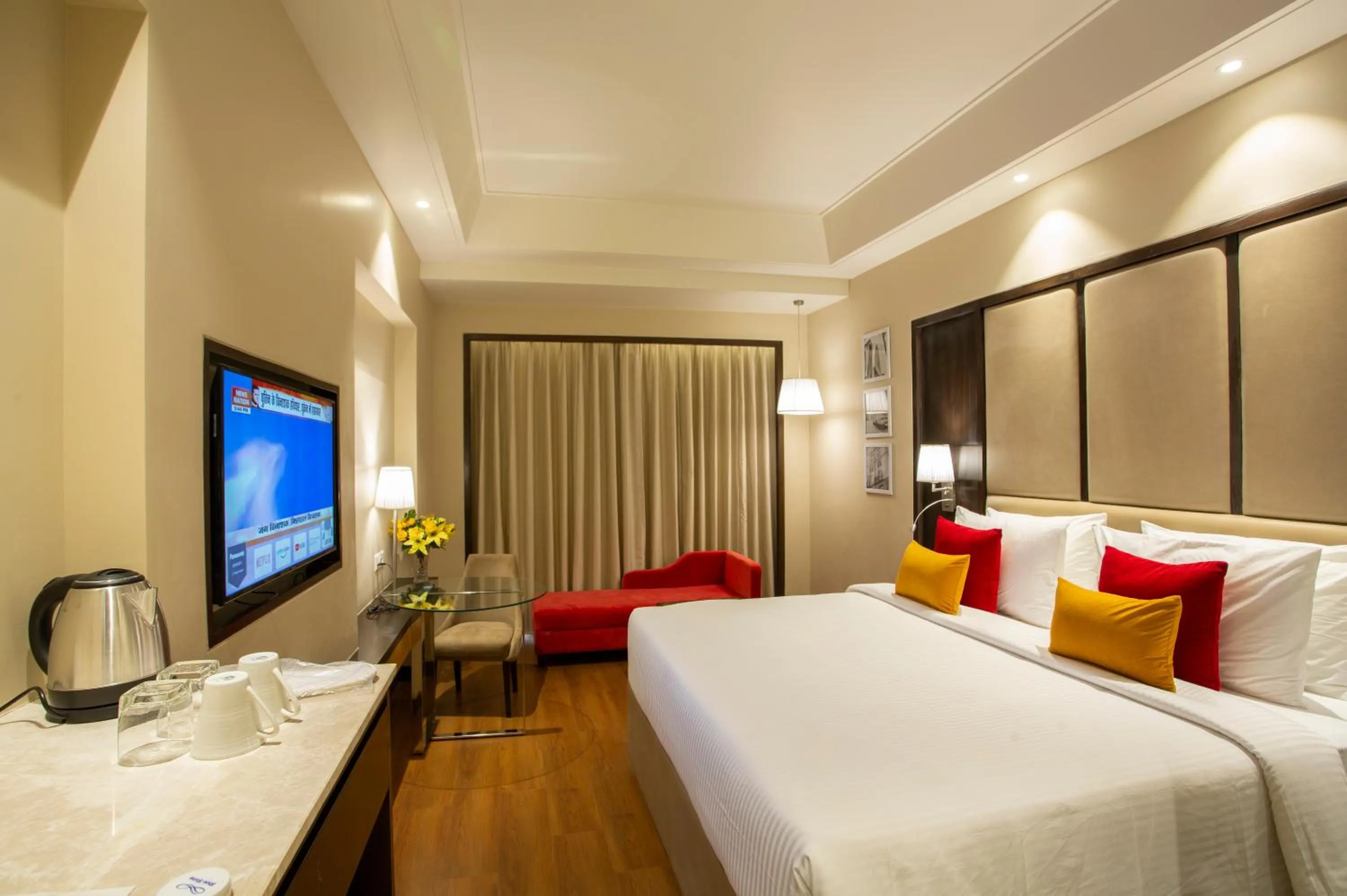 Photo of the whole room, Bed in The Vaishnodevi Sarovar Portico