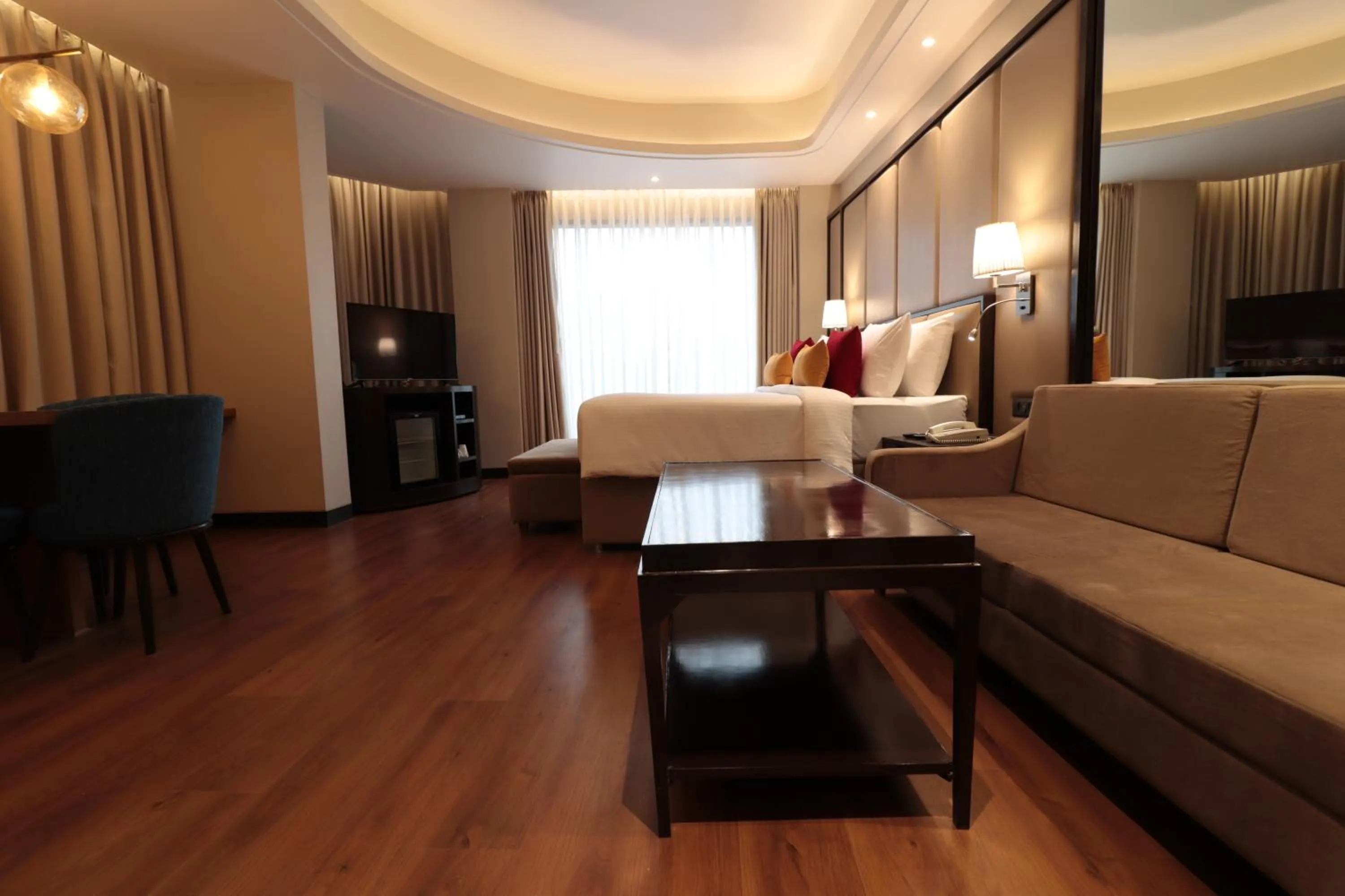 Photo of the whole room, Bed in The Vaishnodevi Sarovar Portico