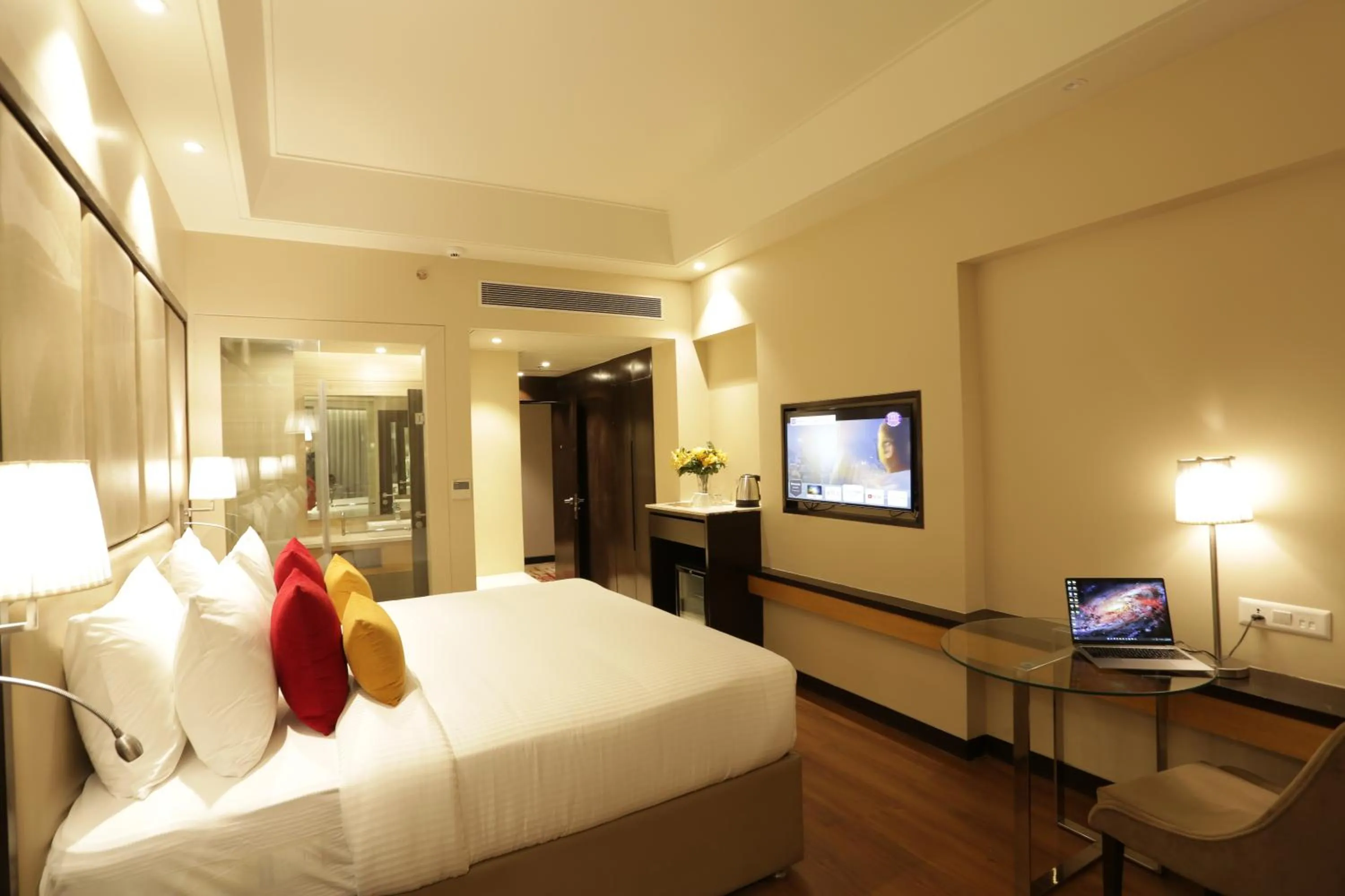 Photo of the whole room, Bed in The Vaishnodevi Sarovar Portico