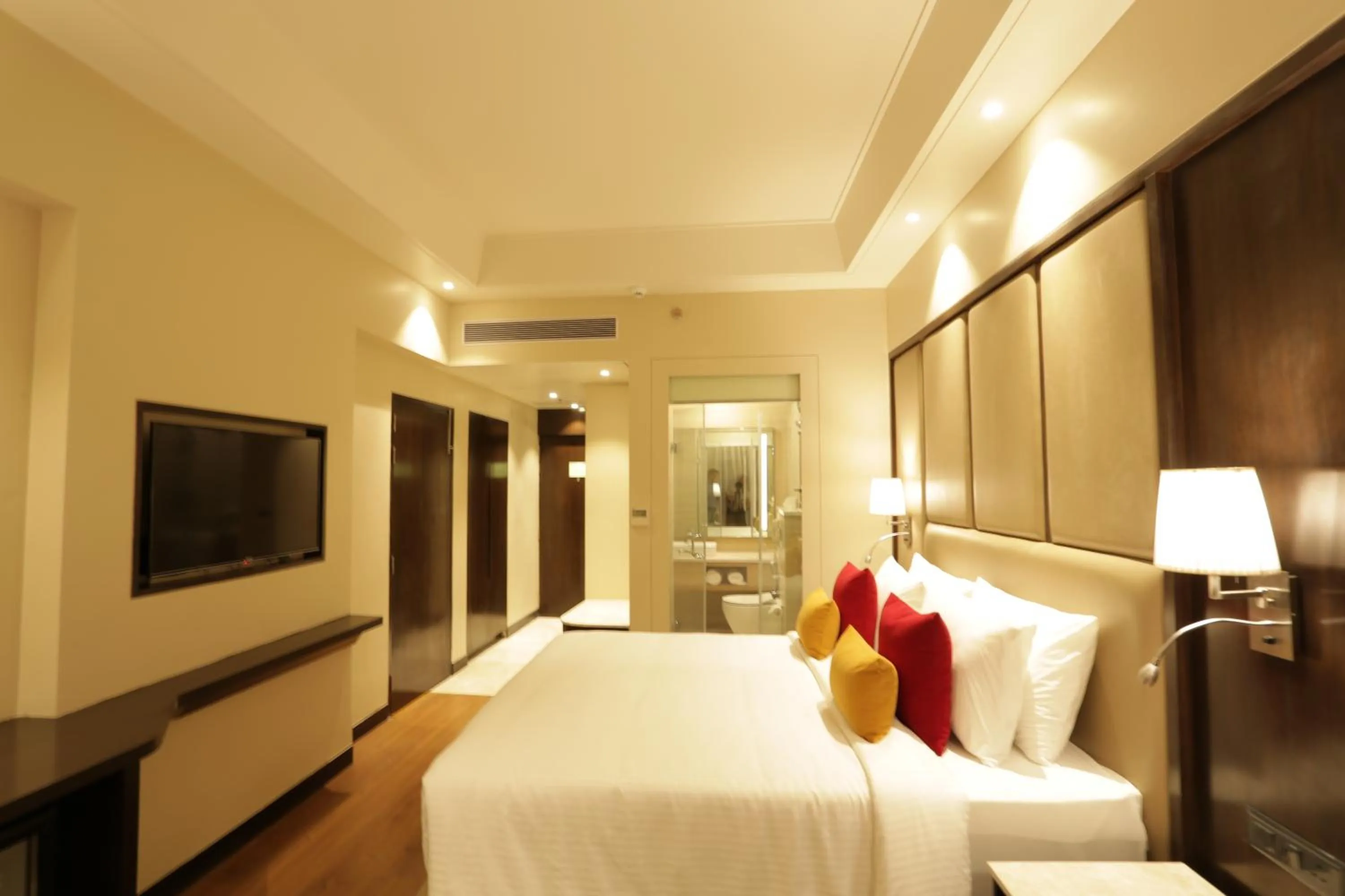 Photo of the whole room, Bed in The Vaishnodevi Sarovar Portico