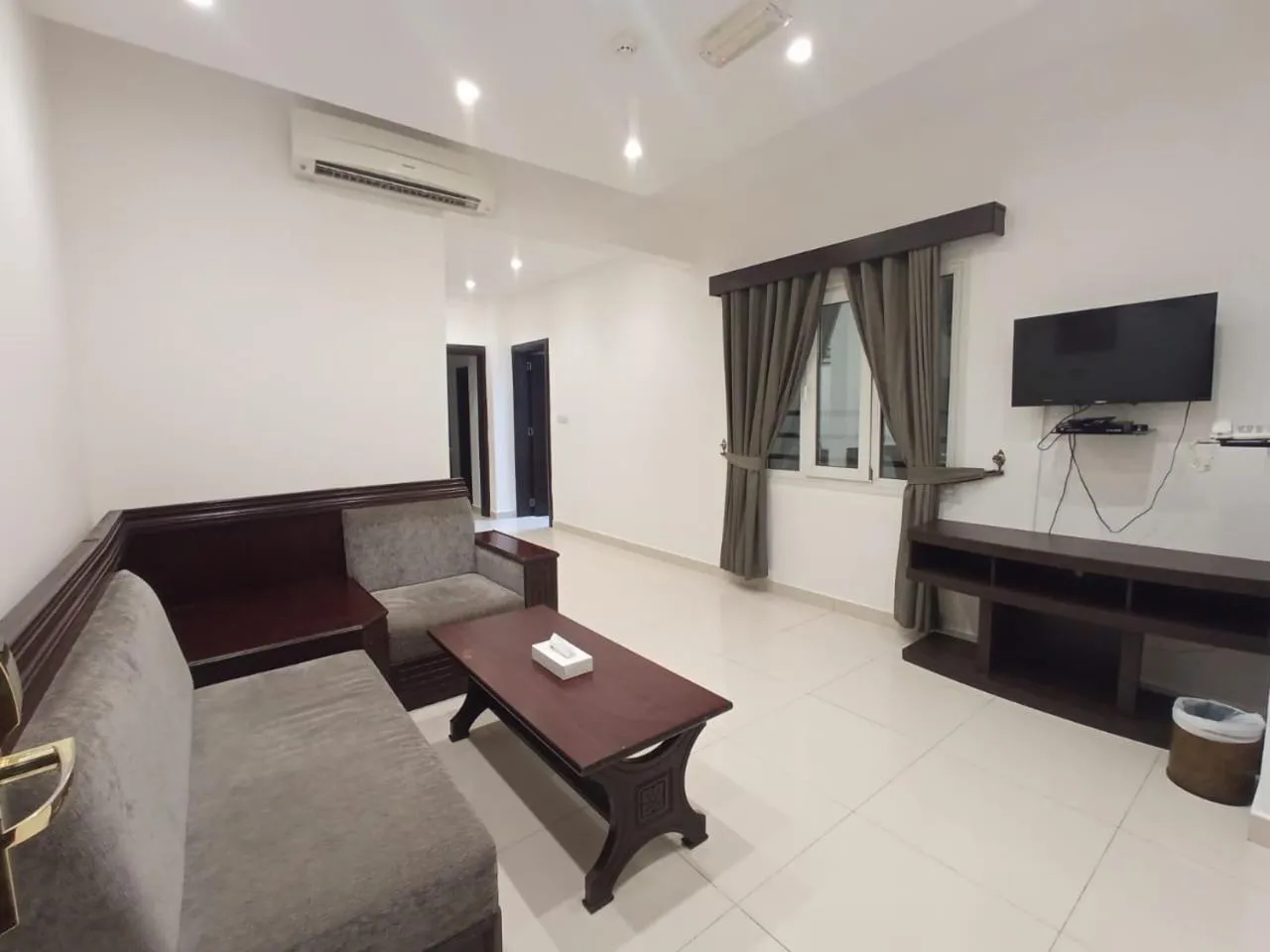 Communal lounge/ TV room in Asfar Hotel Apartments