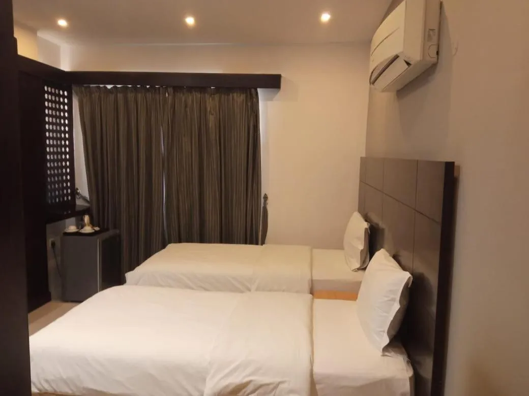 Bed in Asfar Hotel Apartments