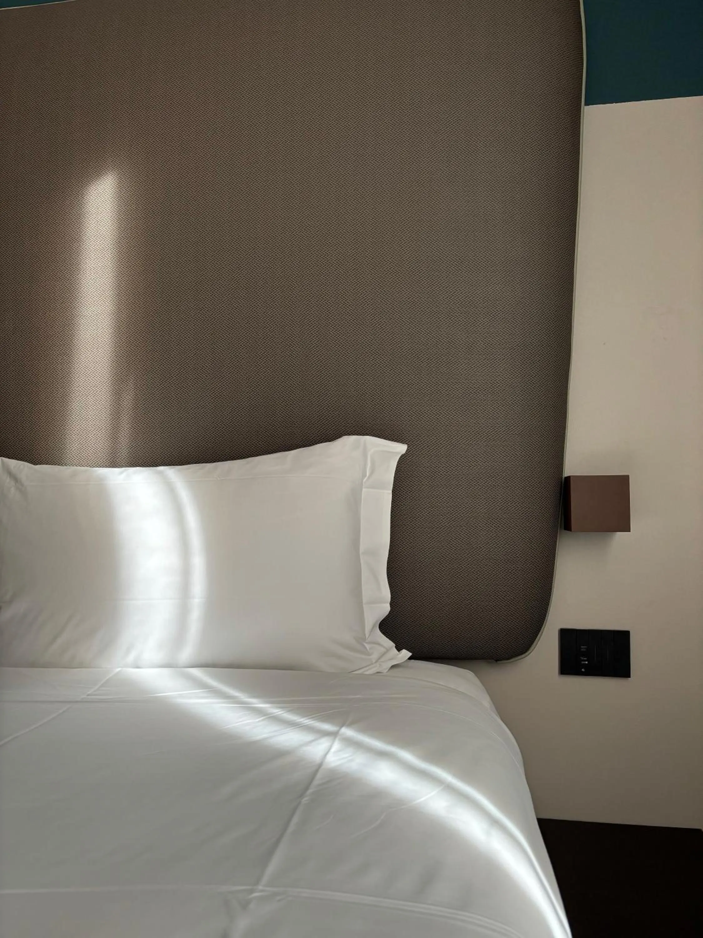 Bed in AV Hotel Milano