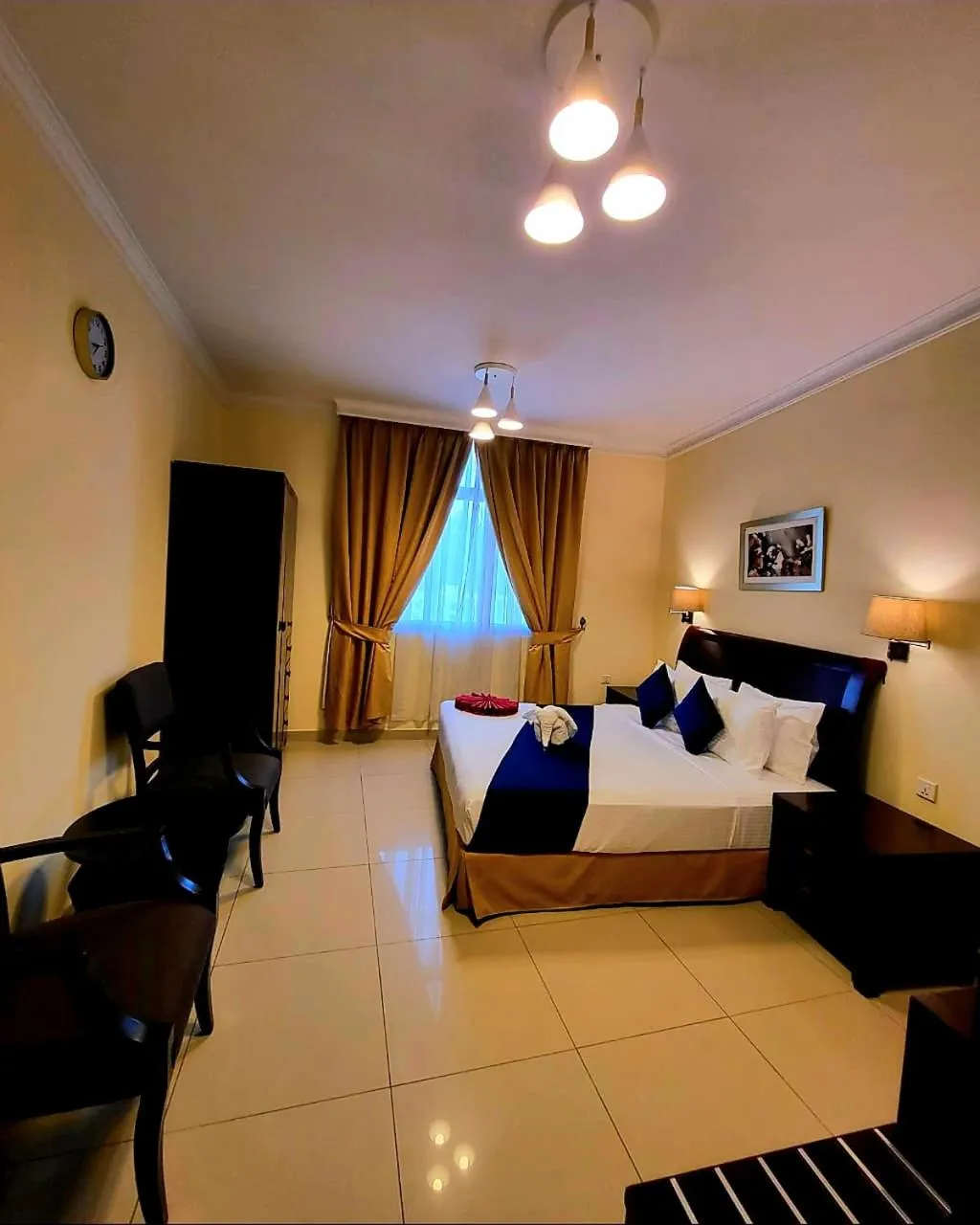 Bed in Crown Palace Hotel