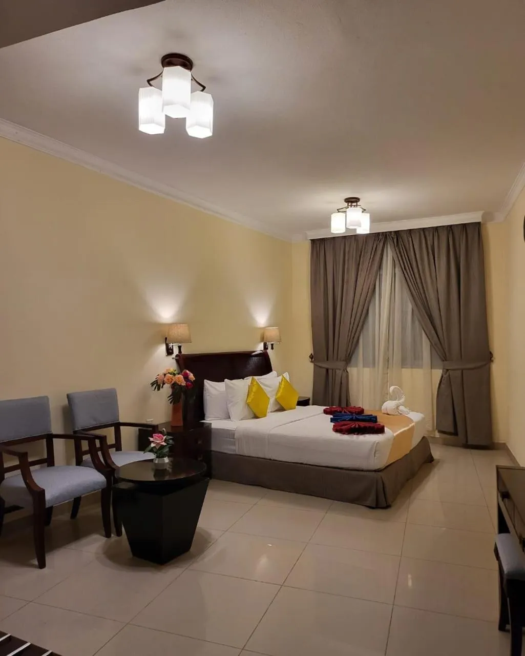 Bed in Crown Palace Hotel