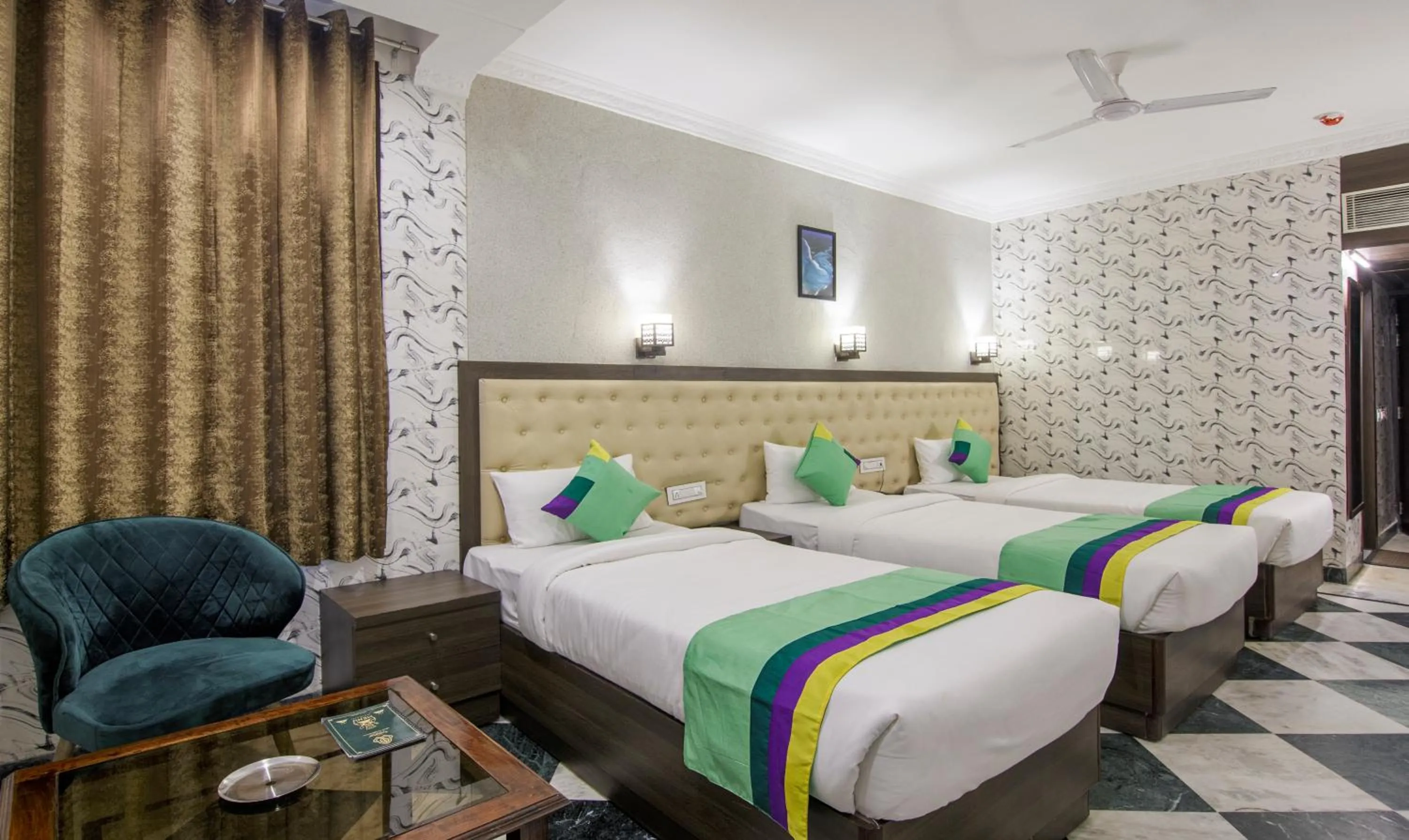 Bed in Treebo Trinetar International