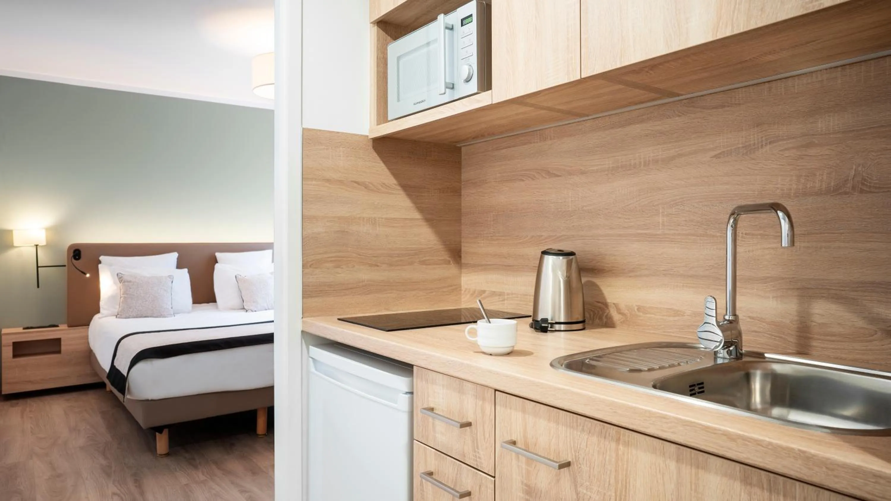 Kitchen or kitchenette, Bed in Residhome Dijon Cité Des Vignes