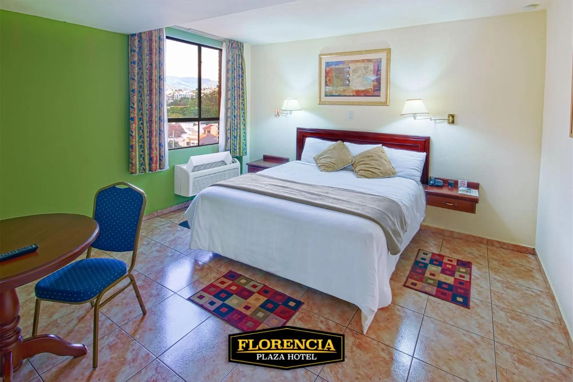 Bed in FLORENCIA PLAZA HOTEL