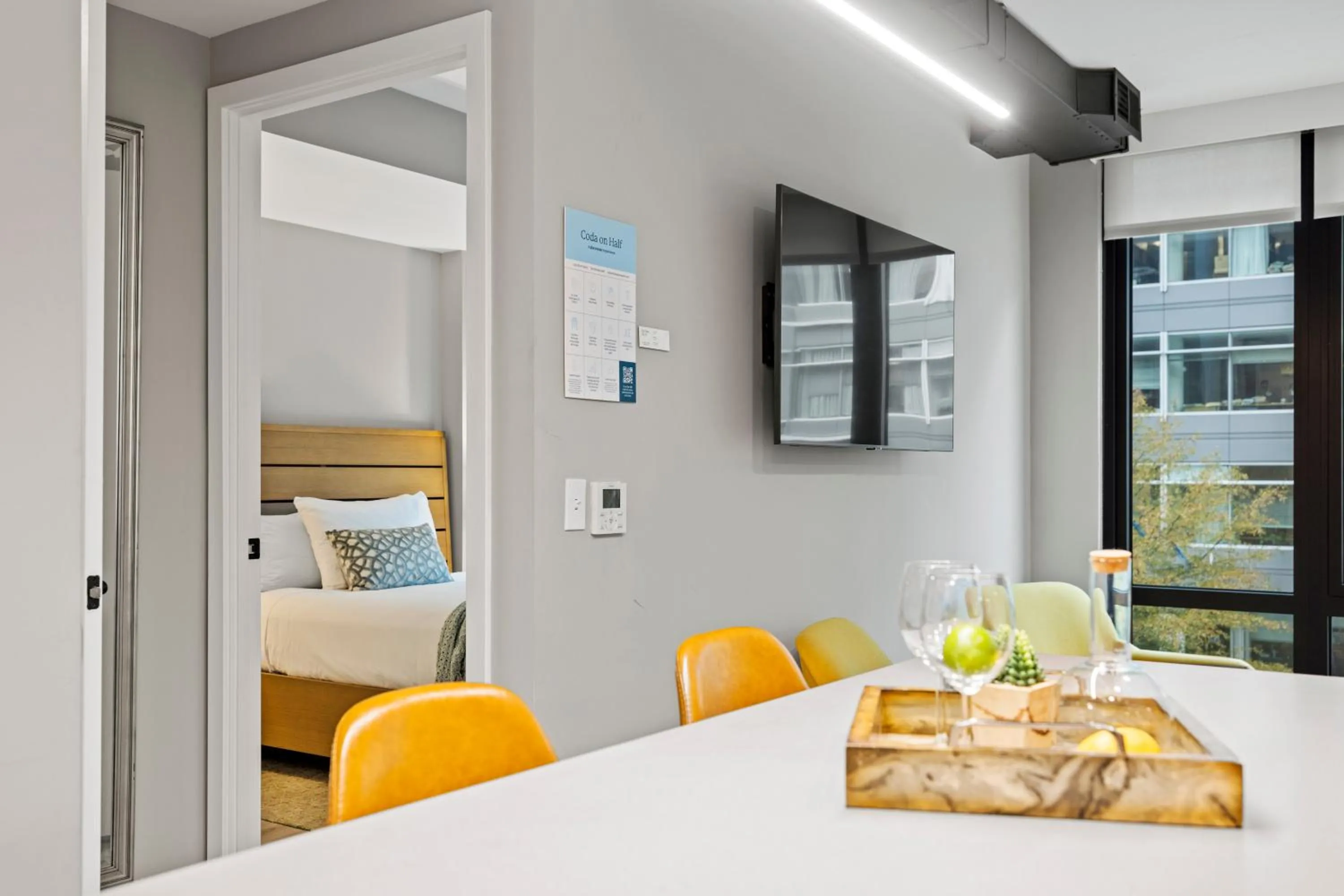 Dining area, Bed in Coda on Half, a Placemakr Experience - Navy Yard