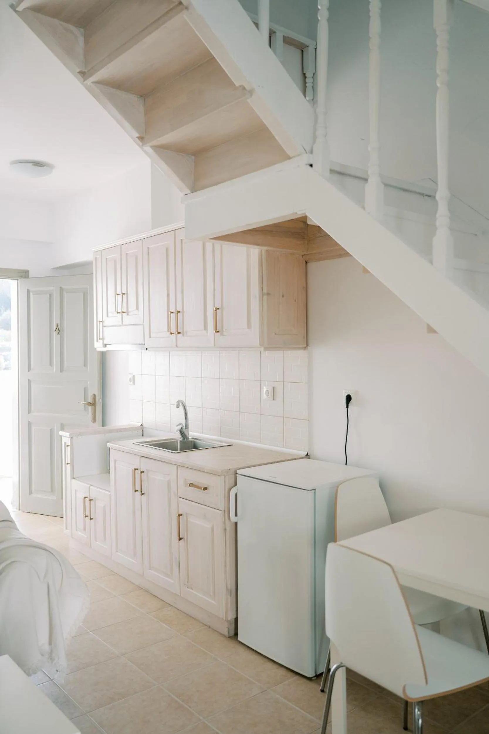 Kitchen or kitchenette in Lindos Harmony Suites