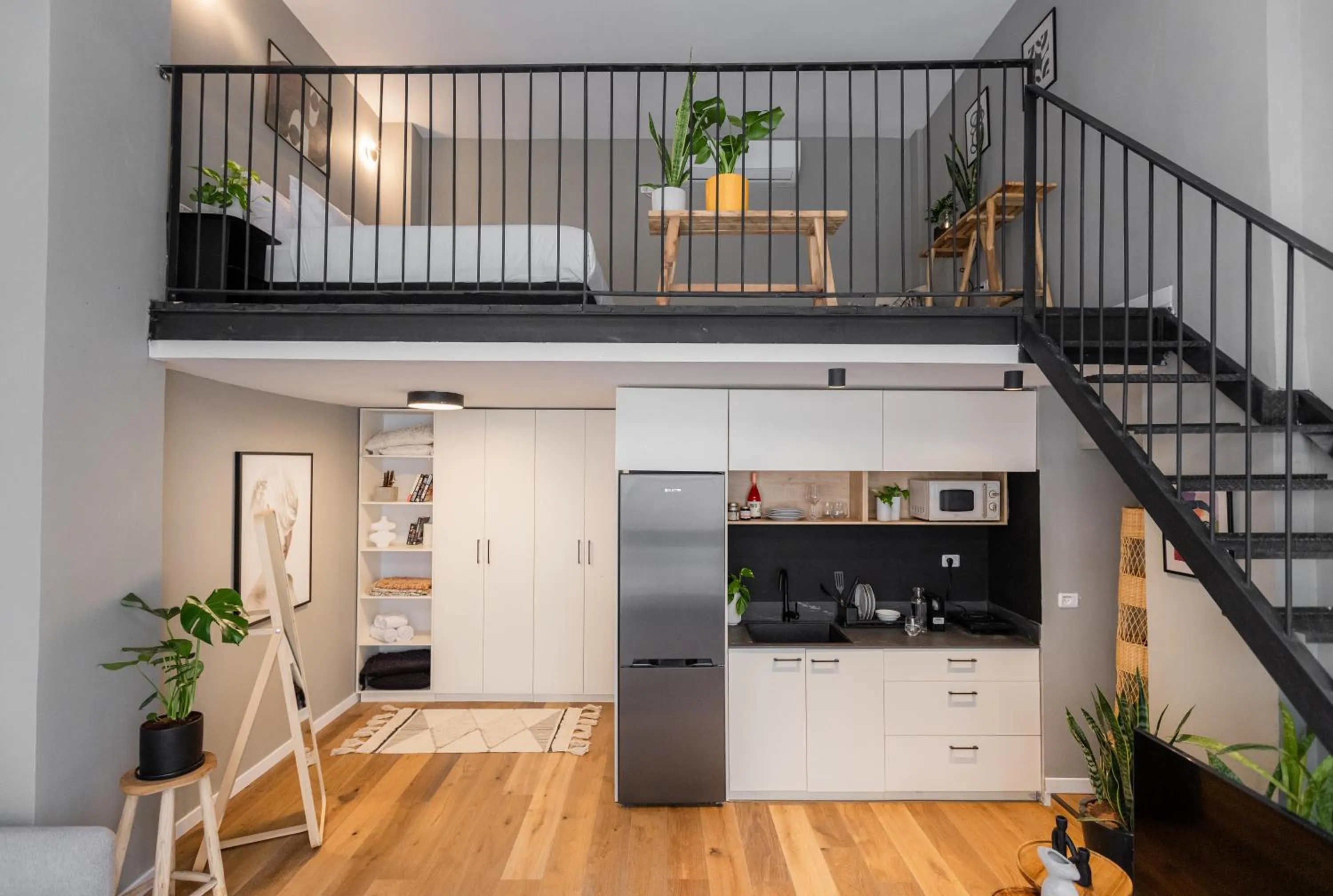 Bed in DeBlox living - Alhambra Apartments