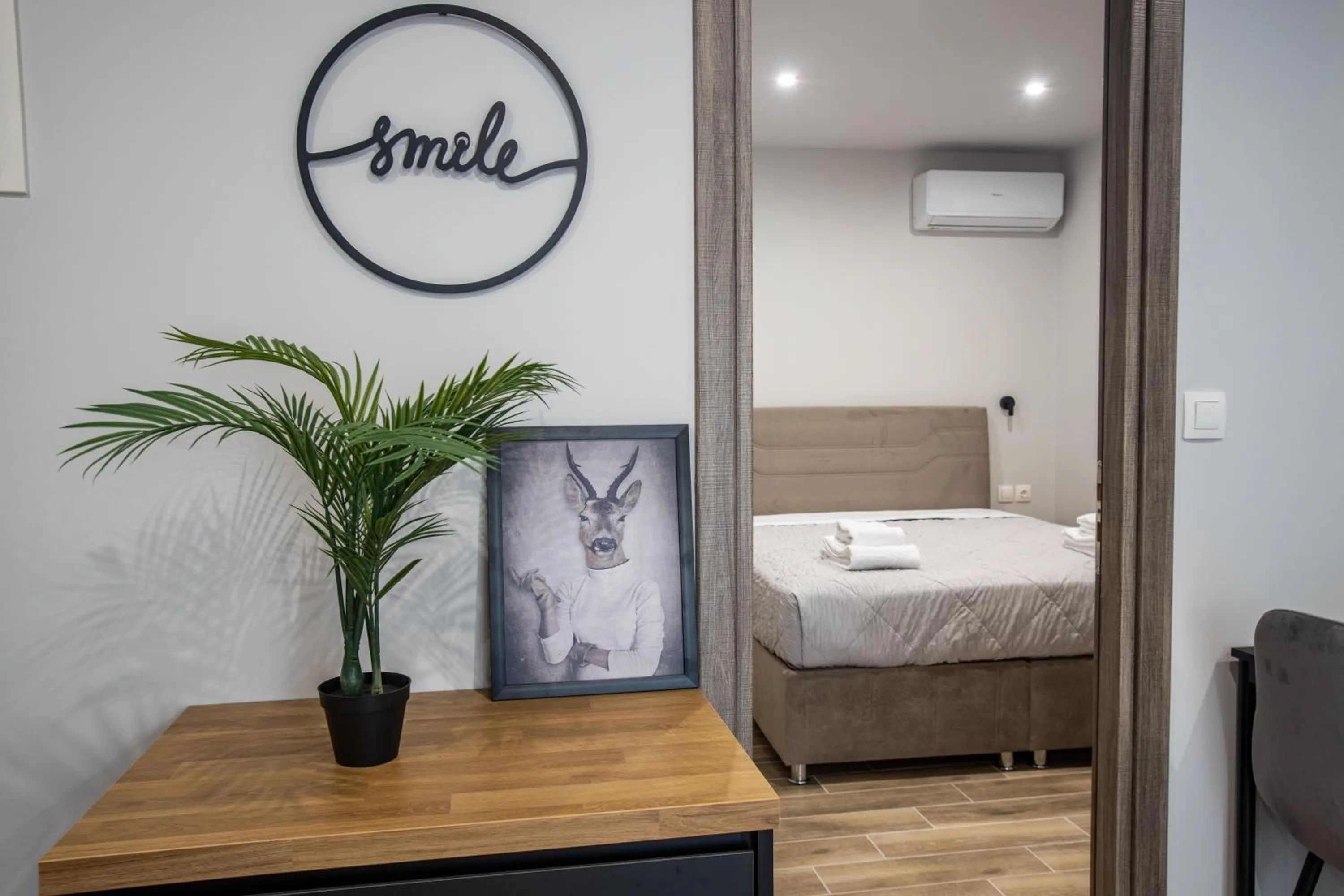 Decorative detail, Bed in Raise Averof Serviced Apartments