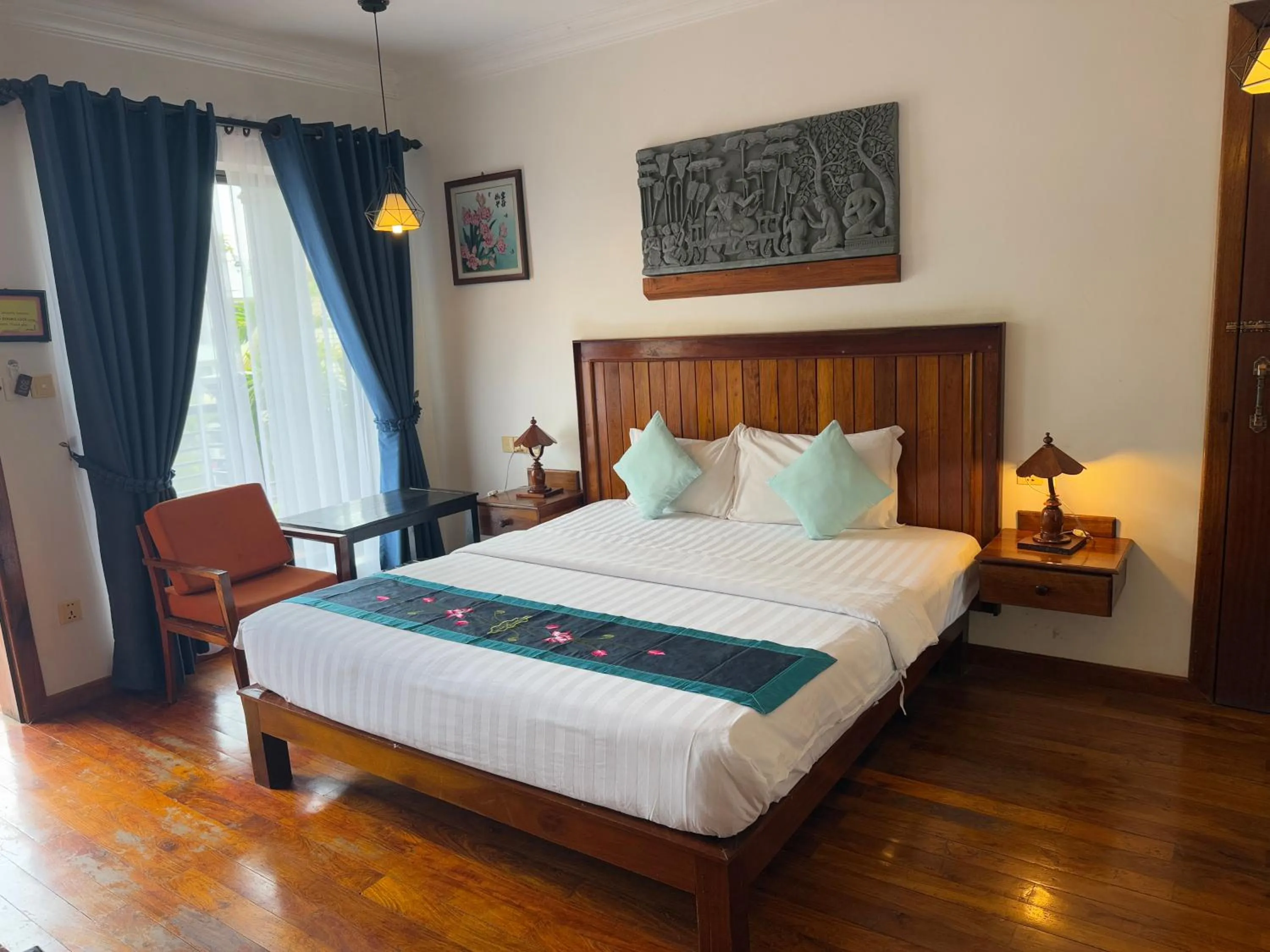 Bed in Asanak D'Angkor Boutique Hotel