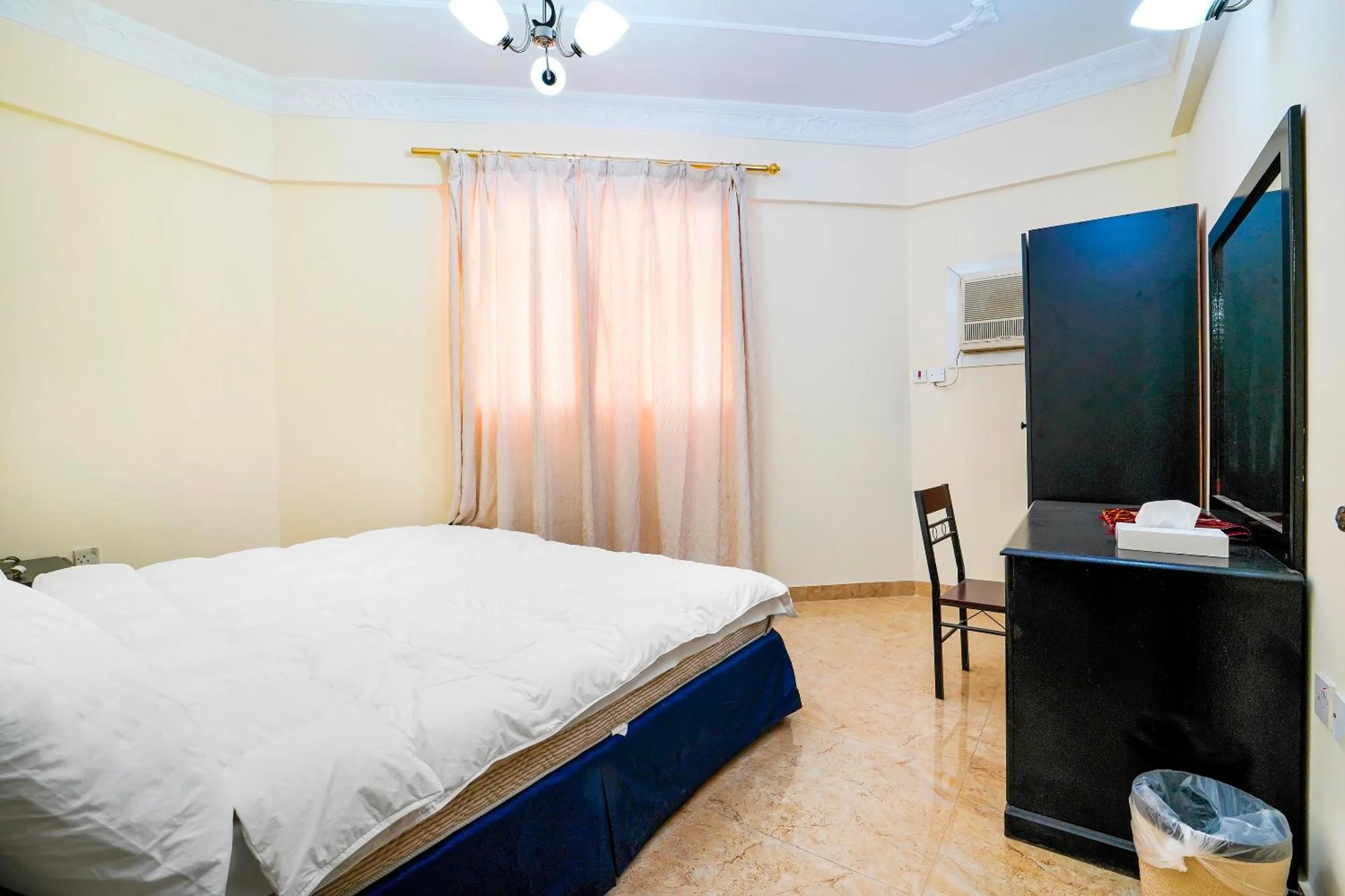 Bedroom, Bed in OYO 124 Al Salam Palace Hotel