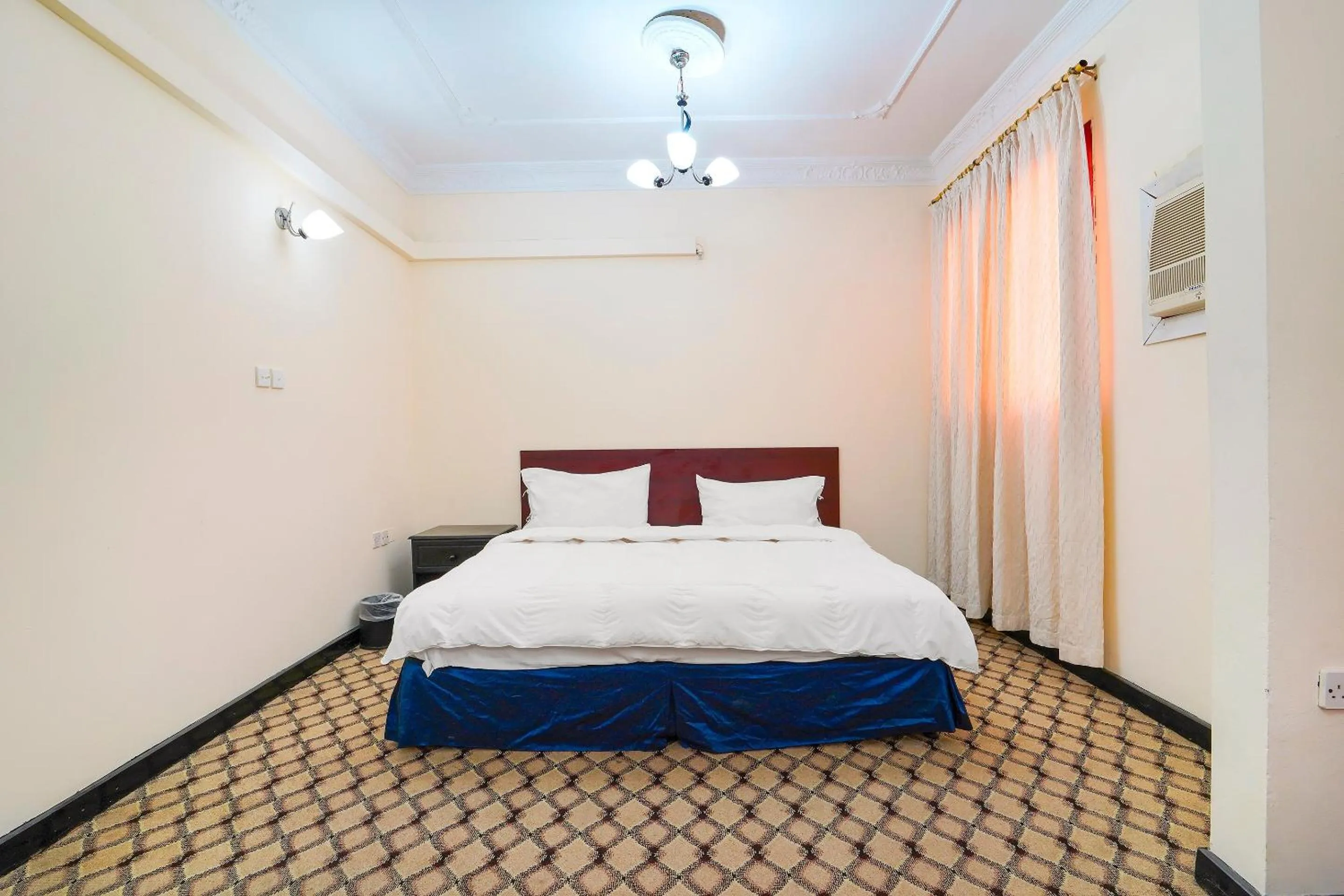 Bedroom, Bed in OYO 124 Al Salam Palace Hotel