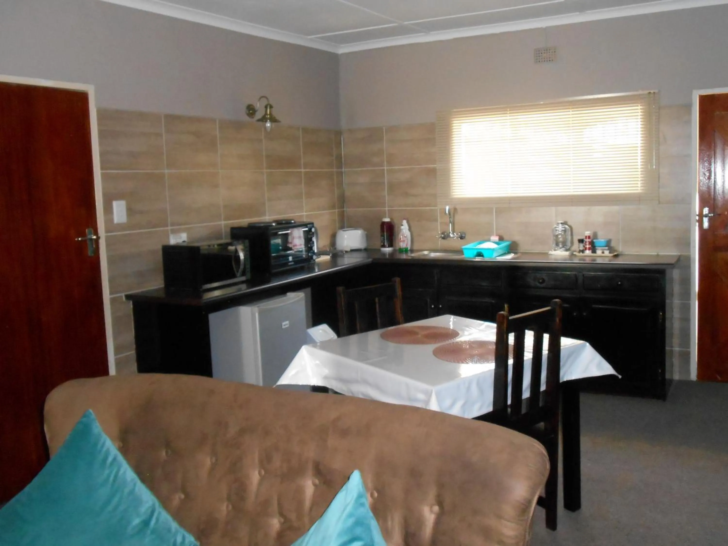 Kitchen or kitchenette in Obesa Lodge