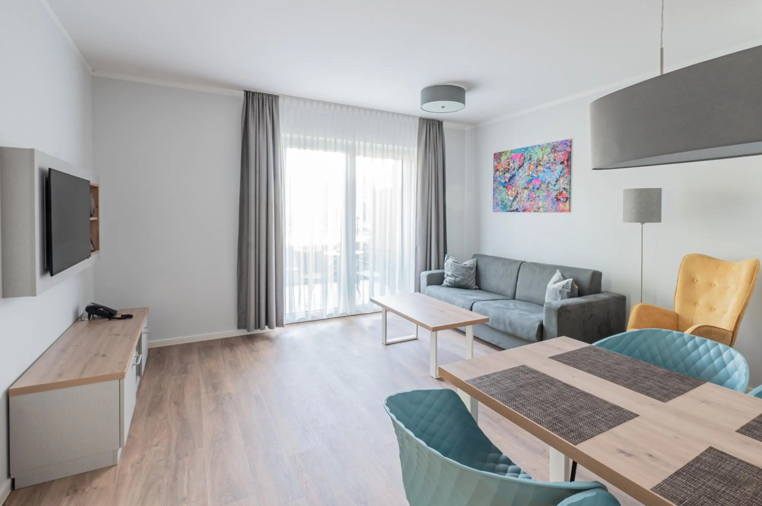 Living room in Sporthotel Neuruppin - Apartmenthaus mit Ferienwohnungen