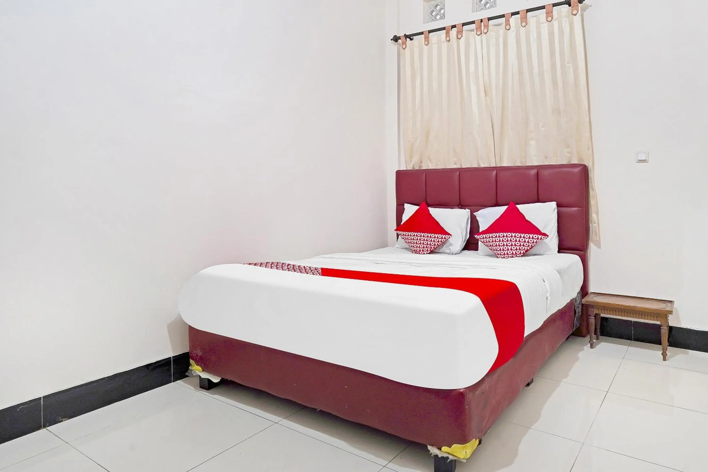 Bedroom in Hotel O Jawara Guest House Syariah