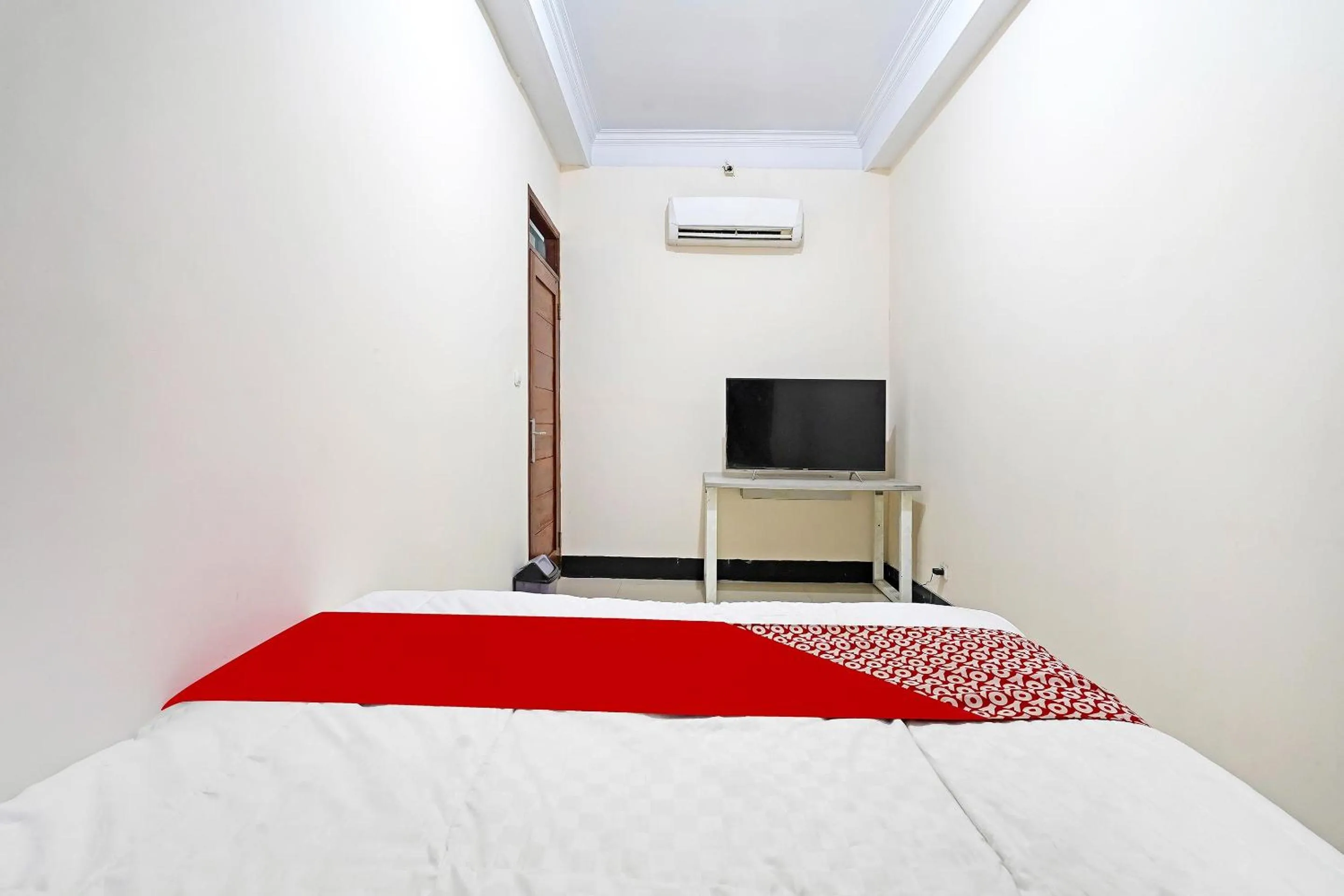 Bedroom in Hotel O Jawara Guest House Syariah
