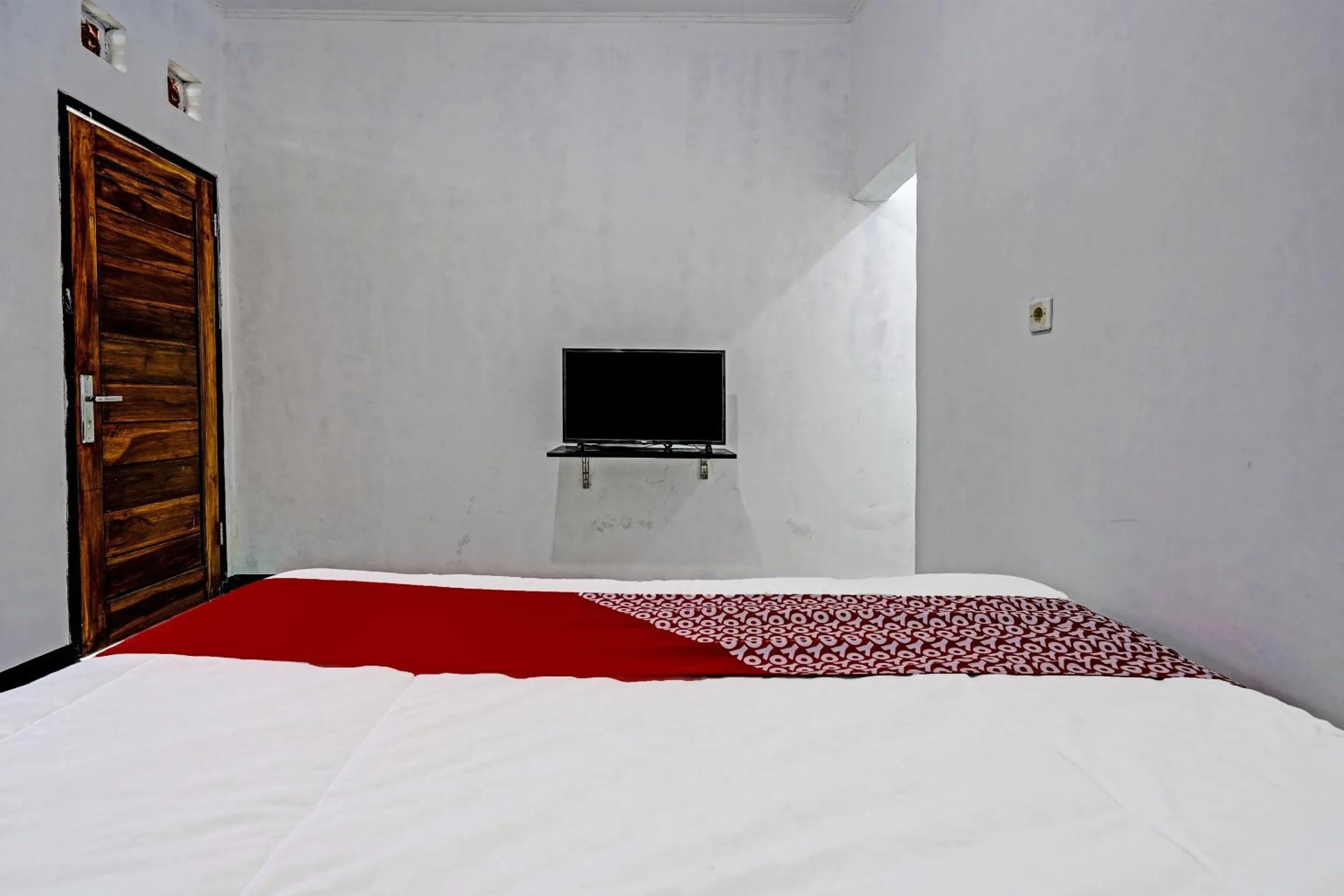 Bedroom, Bed in OYO 91334 Permata Papua Guest House