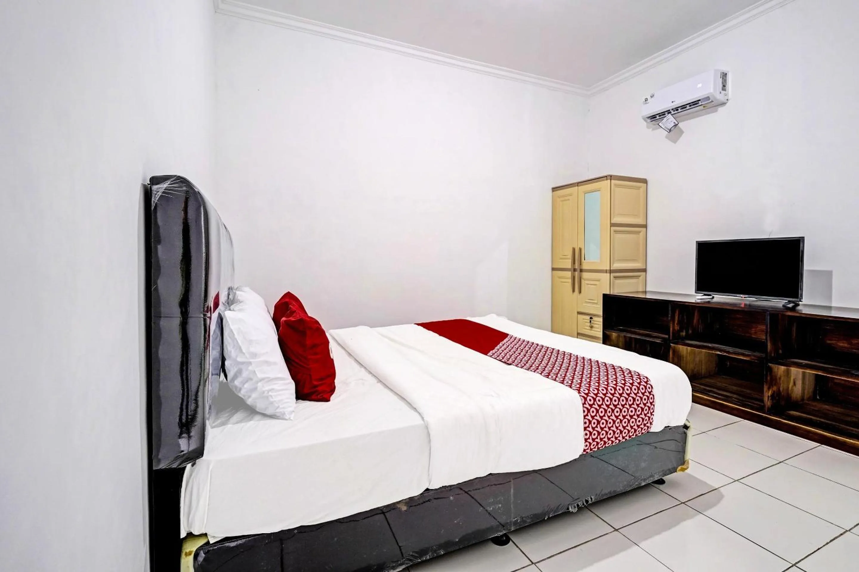Bedroom, Bed in OYO 91334 Permata Papua Guest House