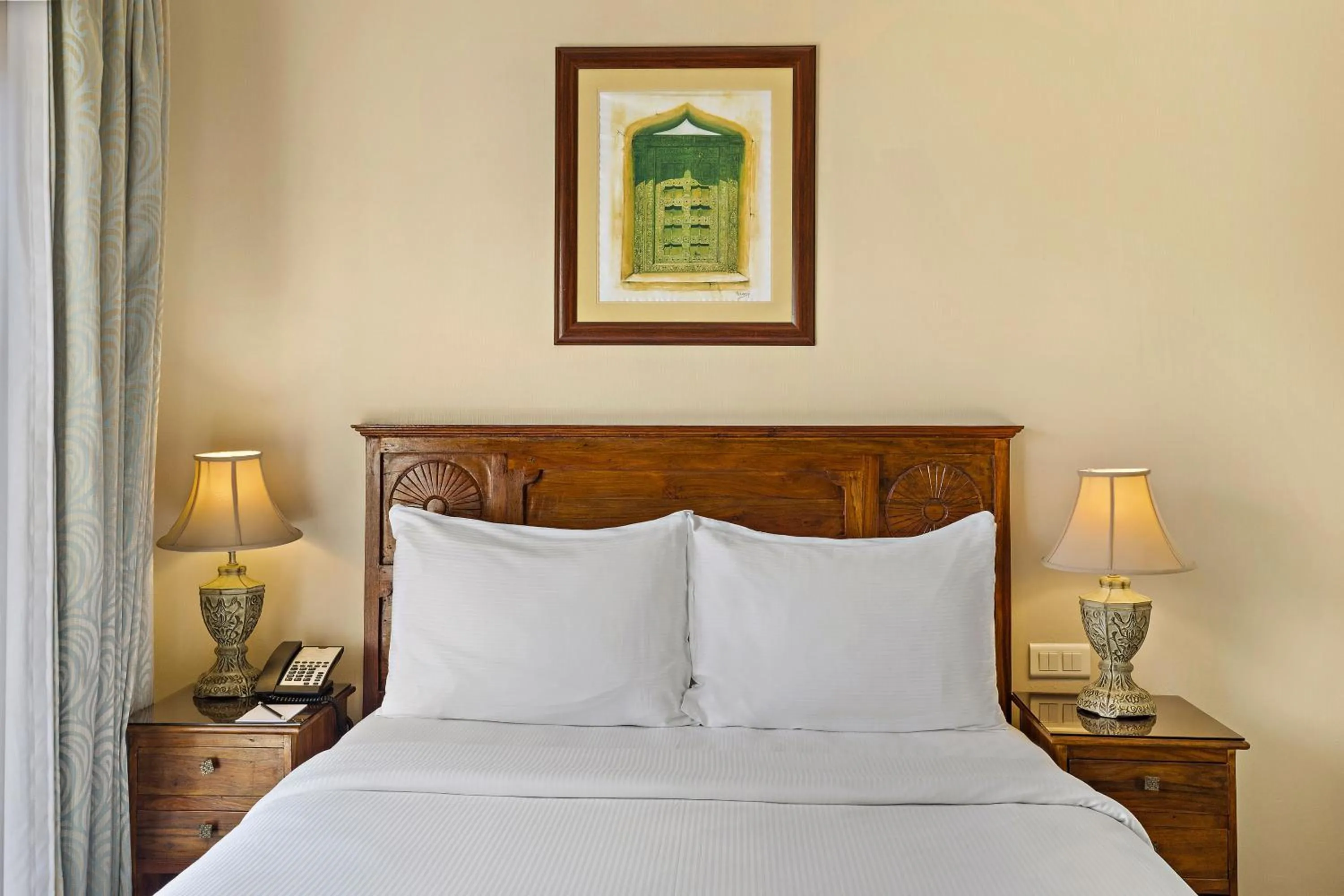 Bed in Al Hamra Village Hotel