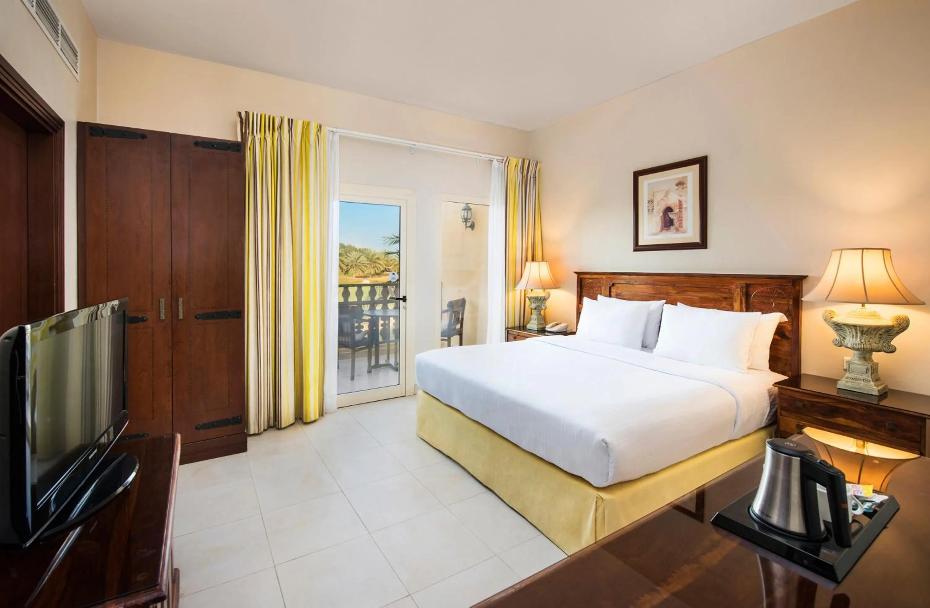 Bedroom, Bed in Al Hamra Village Hotel