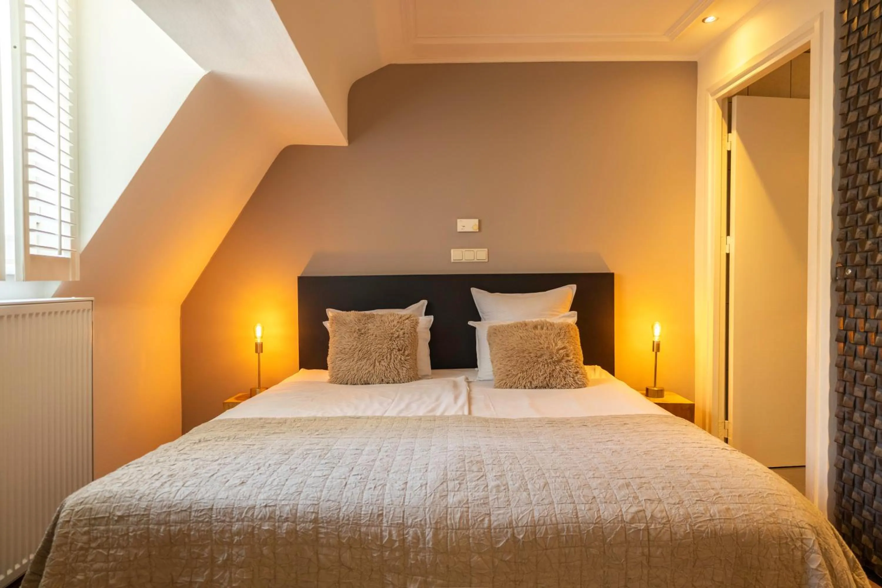 Bed in Bouteaque Hotel