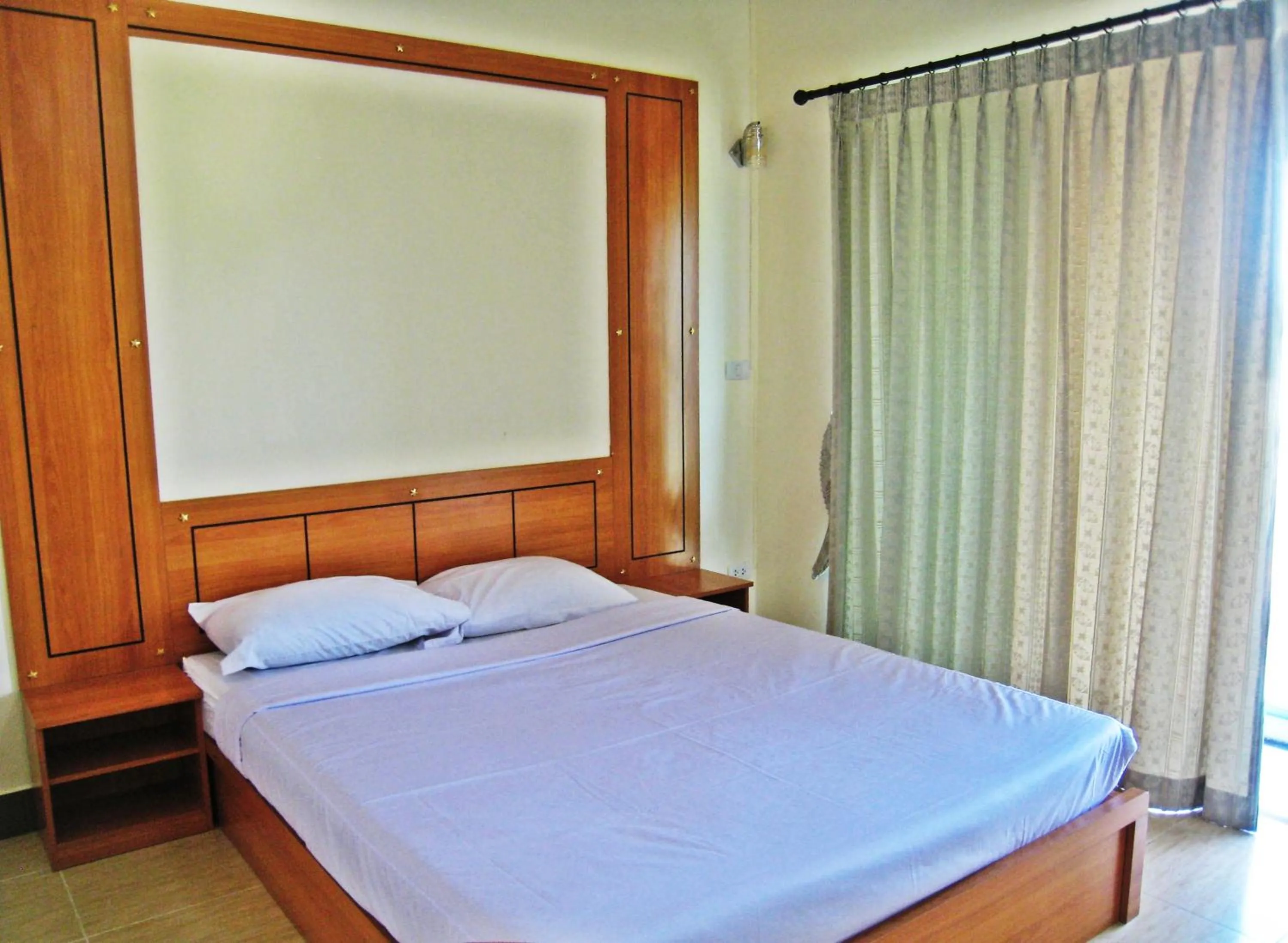 Bed in Choktawee Residence and Mansion
