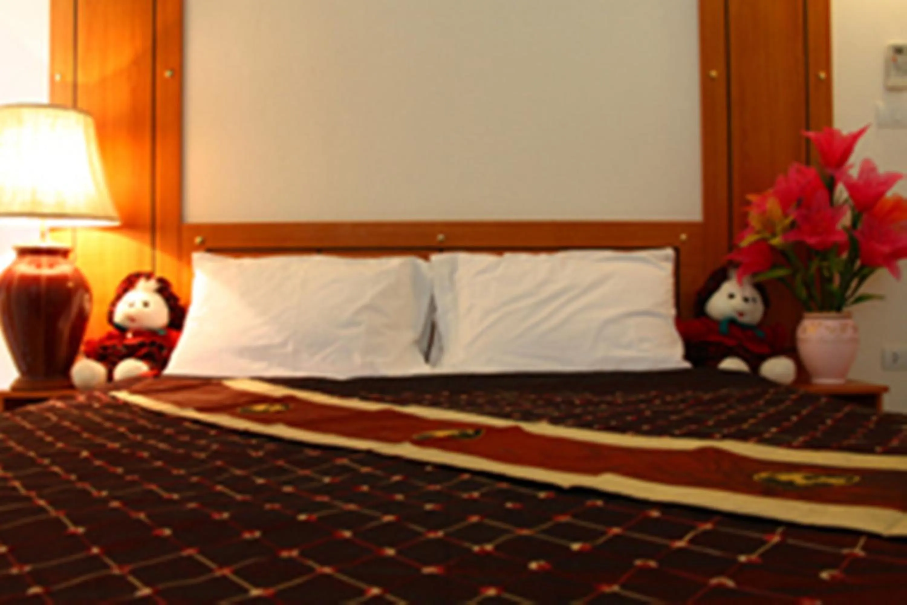 Bed in Choktawee Residence and Mansion