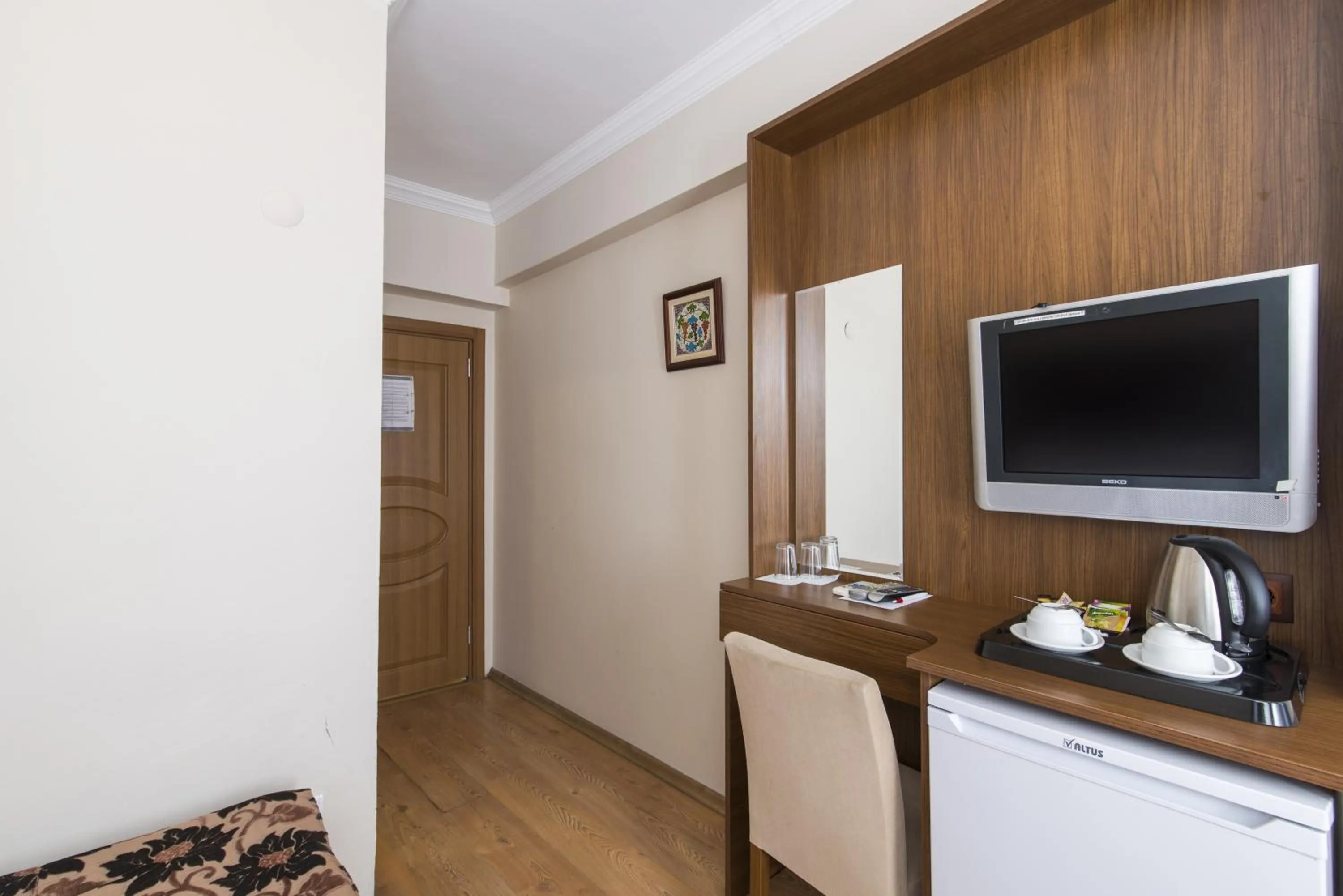 Decorative detail, TV/Entertainment Center in Sultan's Inn