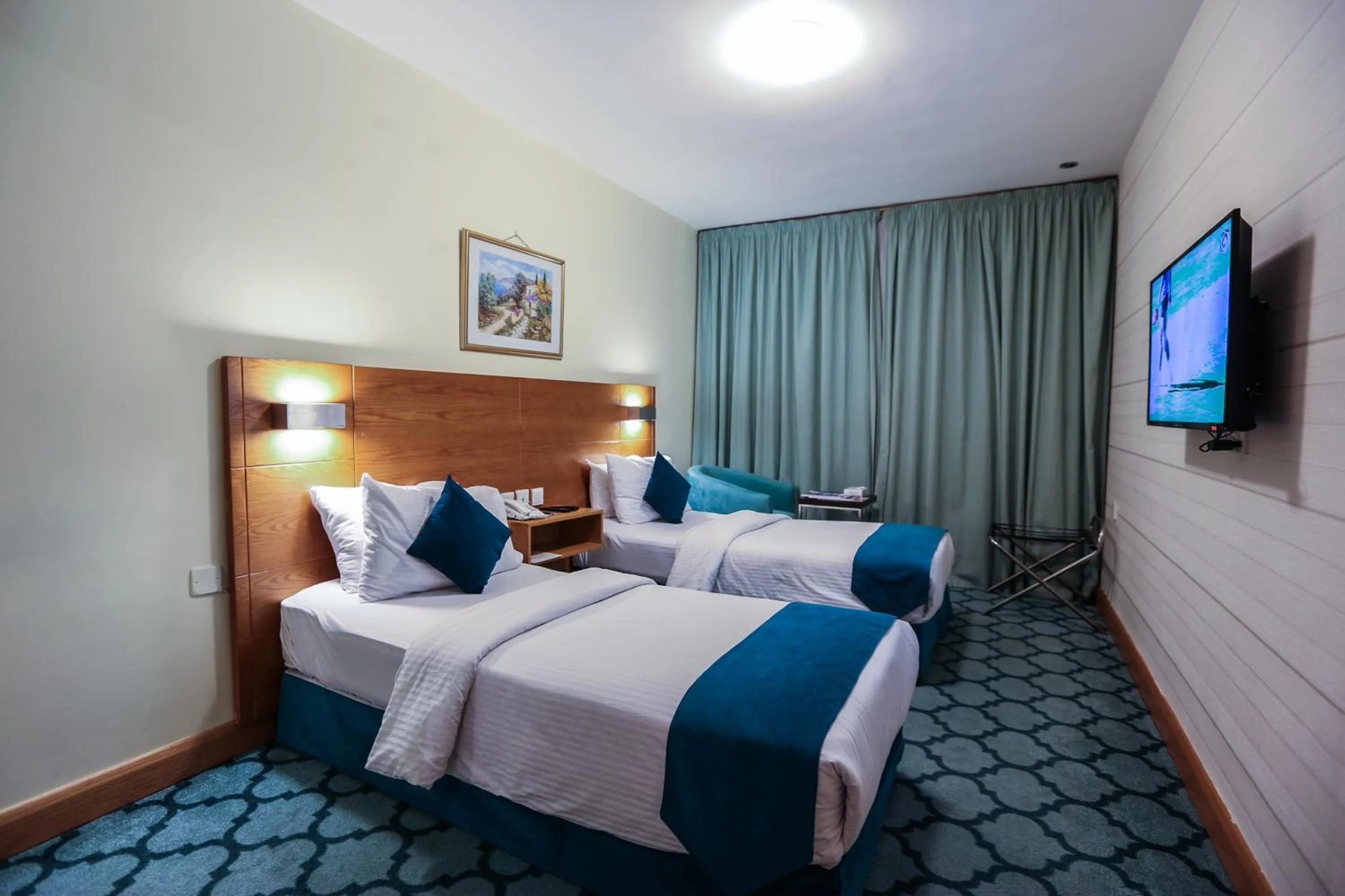 Bed in Khuttar Apartment