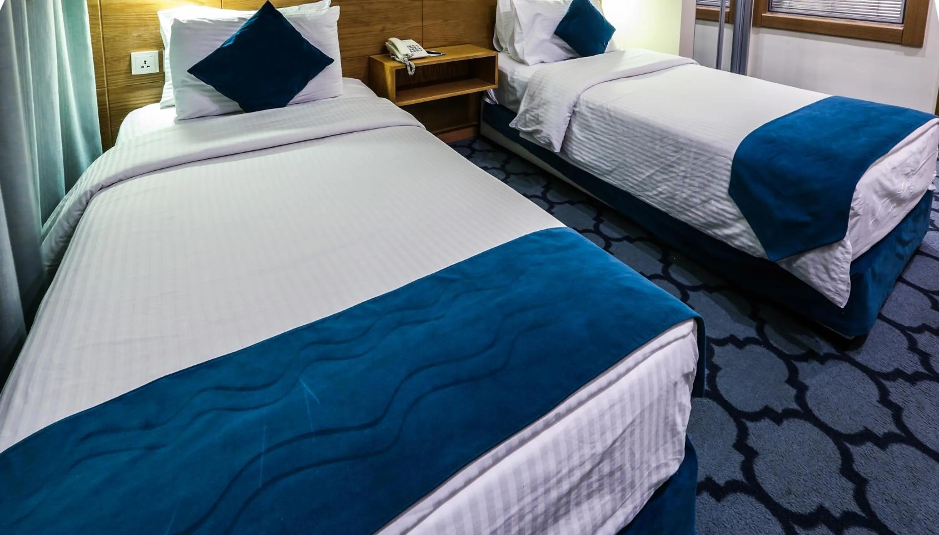 Bed in Khuttar Apartment