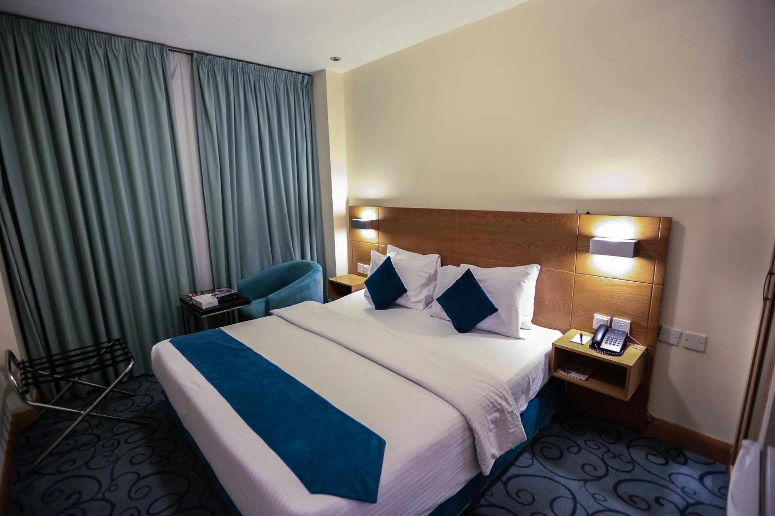 Bed in Khuttar Apartment