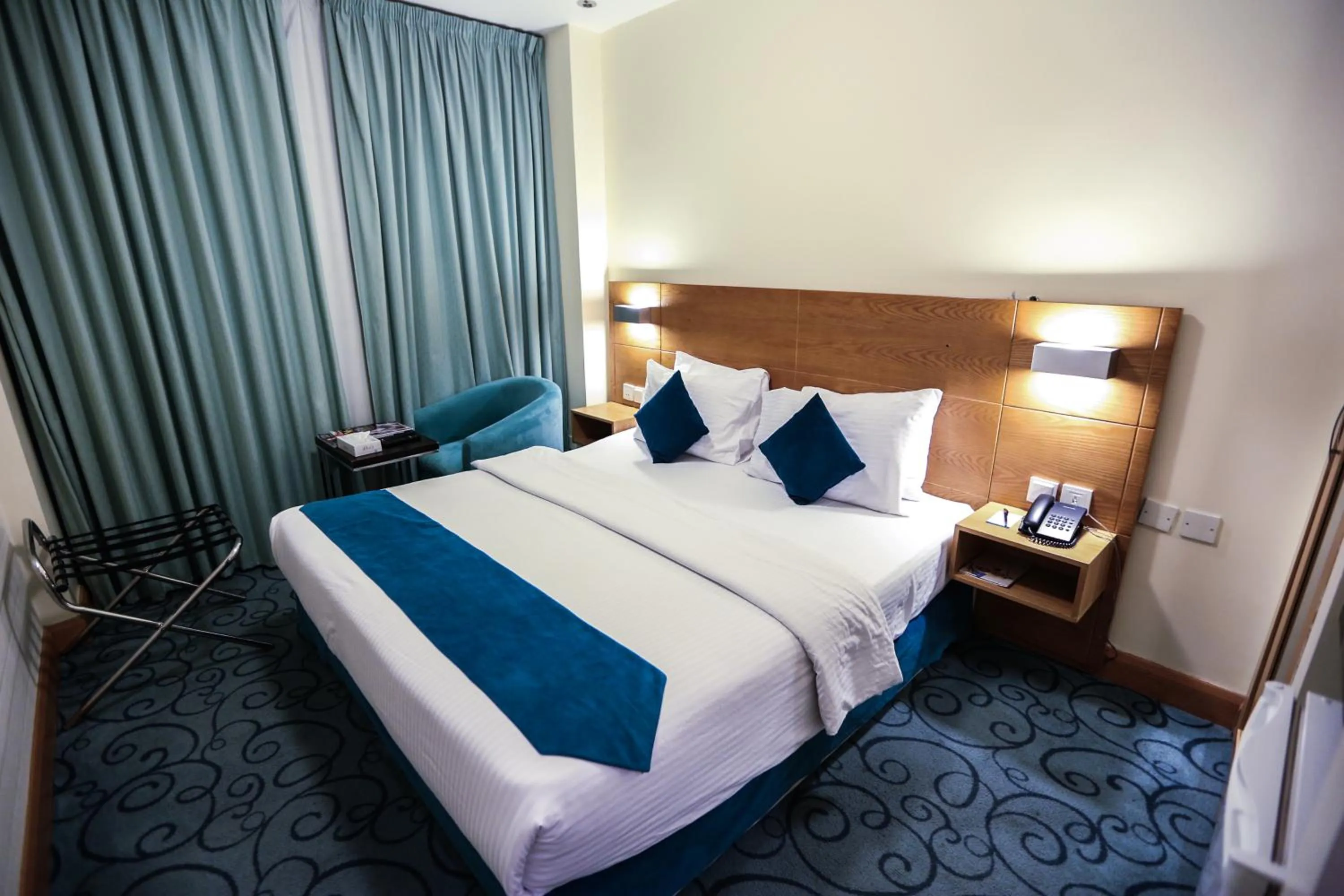 Bed in Khuttar Apartment