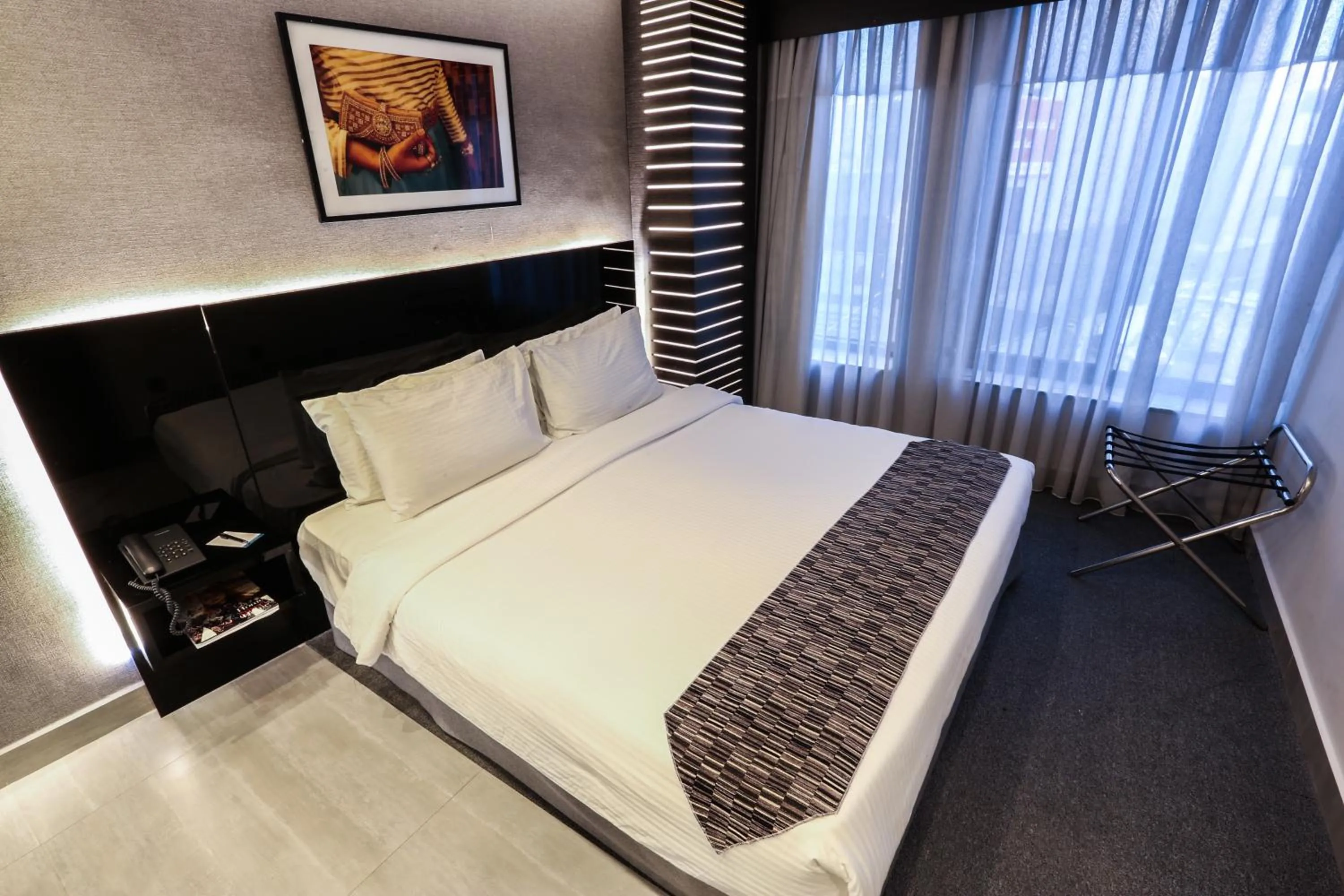 Bed in Khuttar Apartment