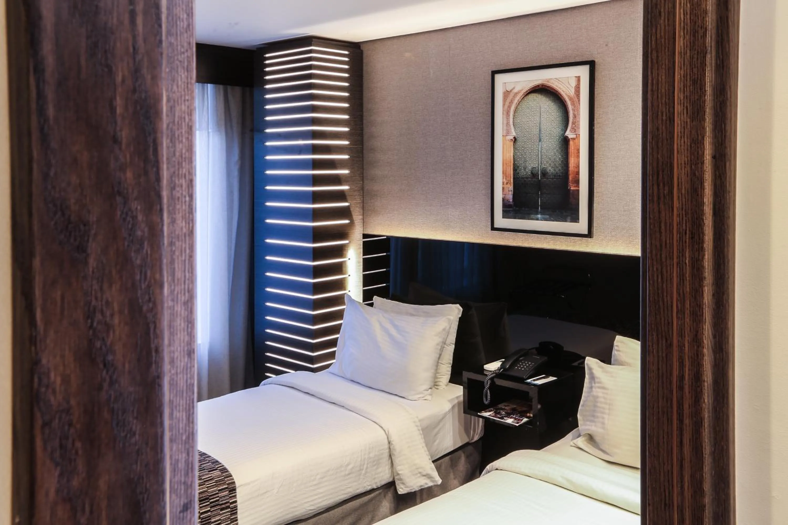 Bed in Khuttar Apartment