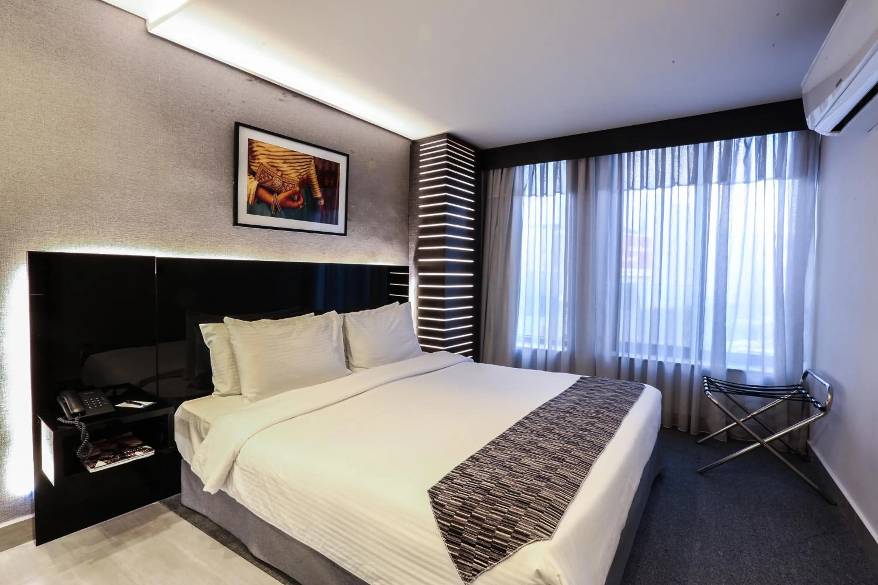 Bed in Khuttar Apartment