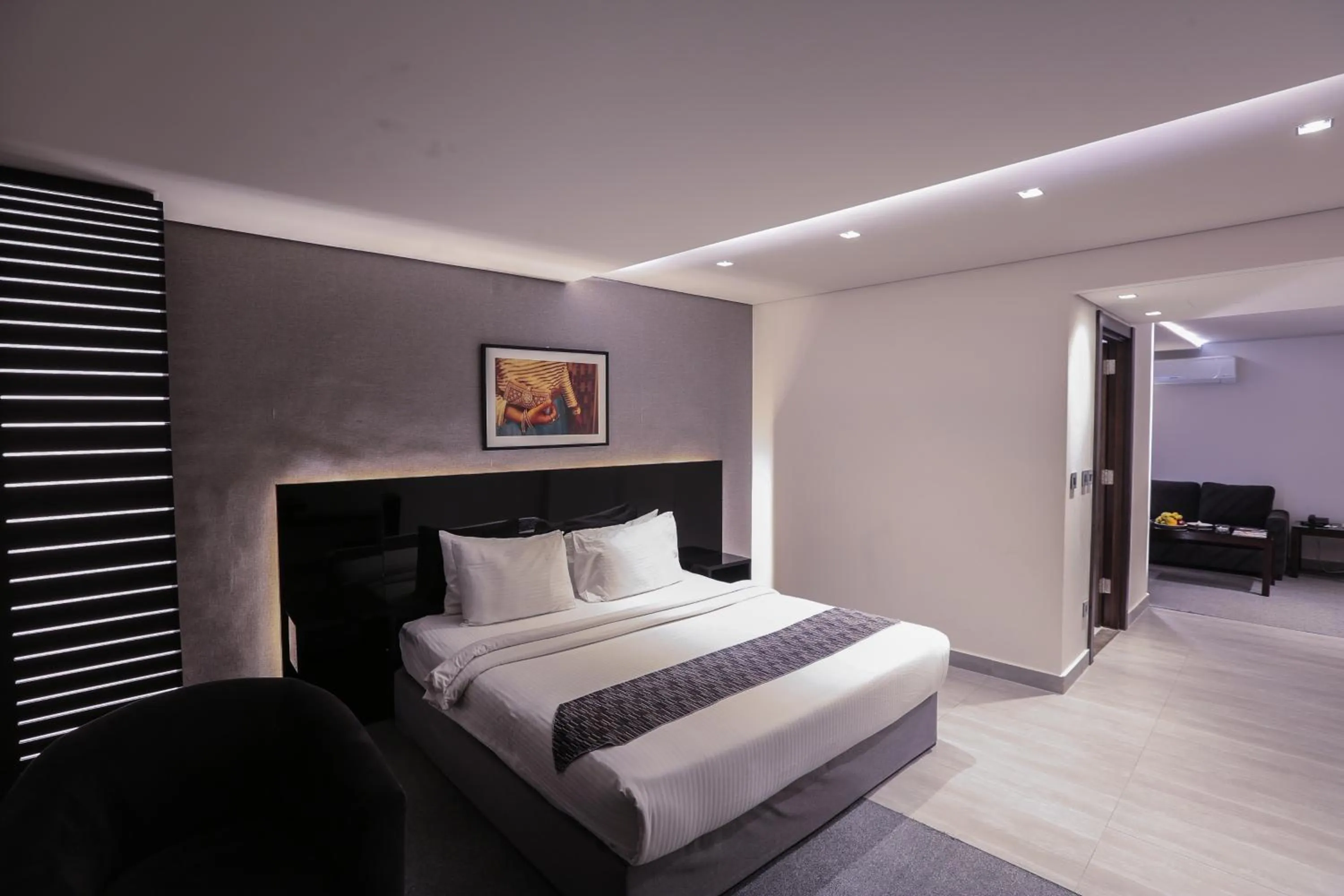 Bed in Khuttar Apartment