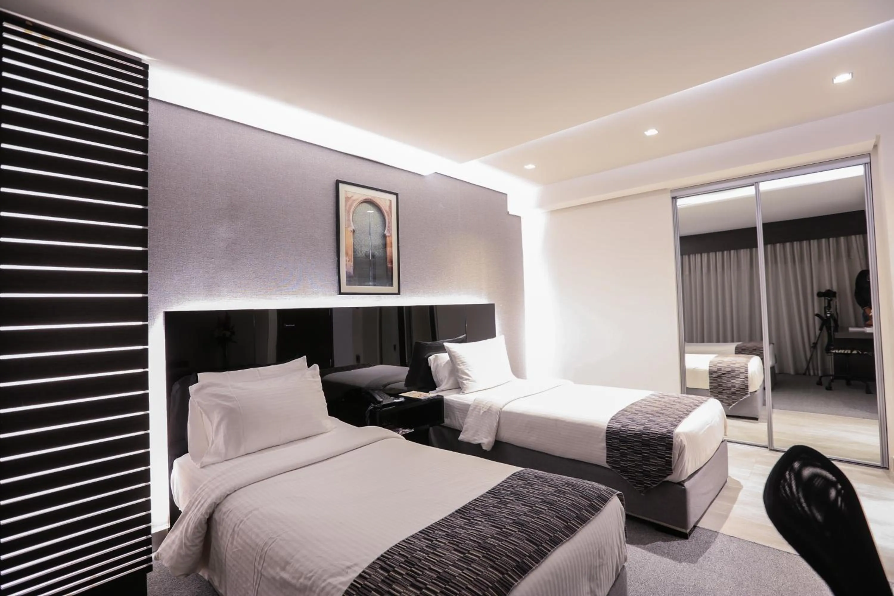 Bed in Khuttar Apartment