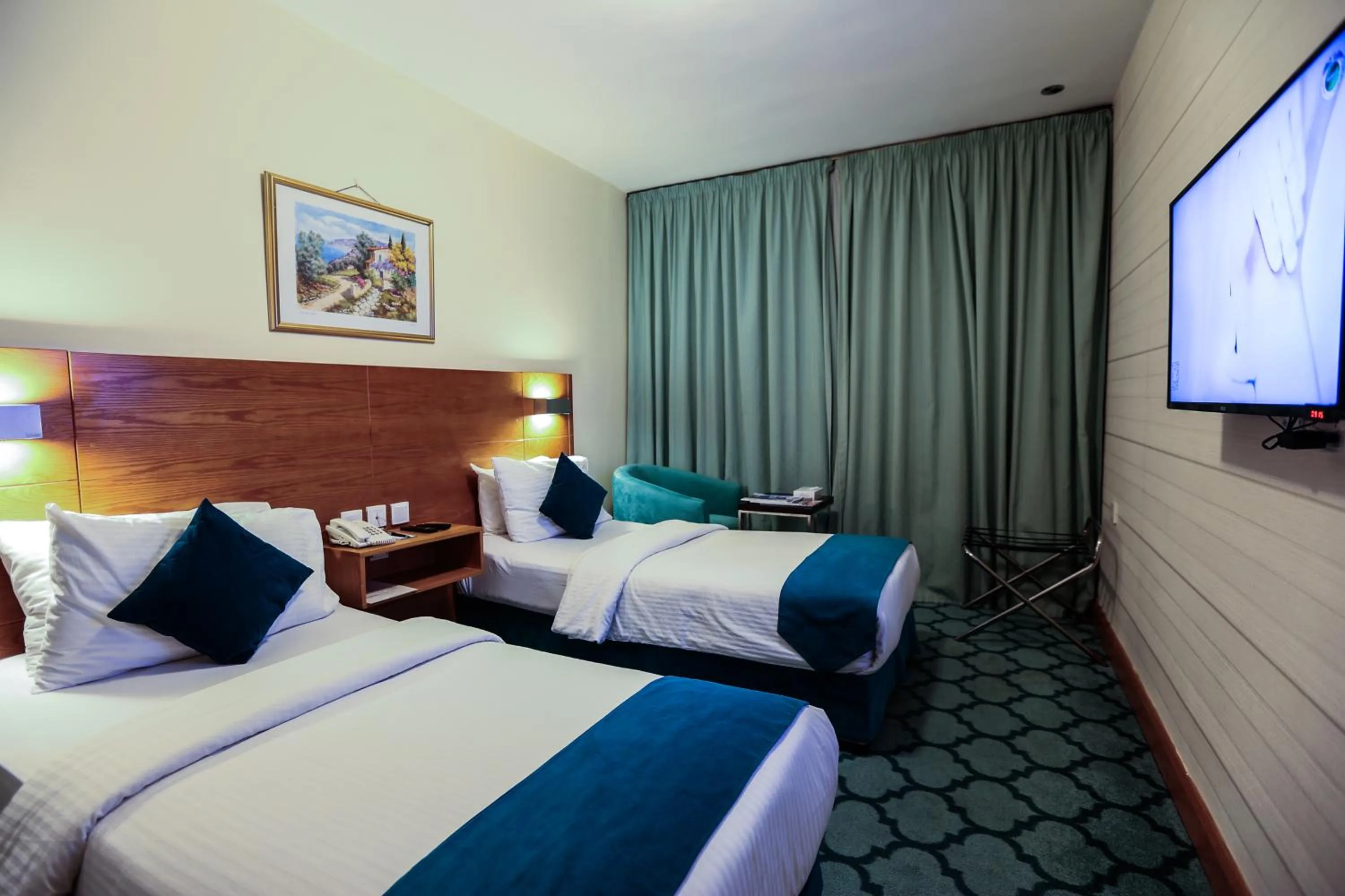 Bed in Khuttar Apartment