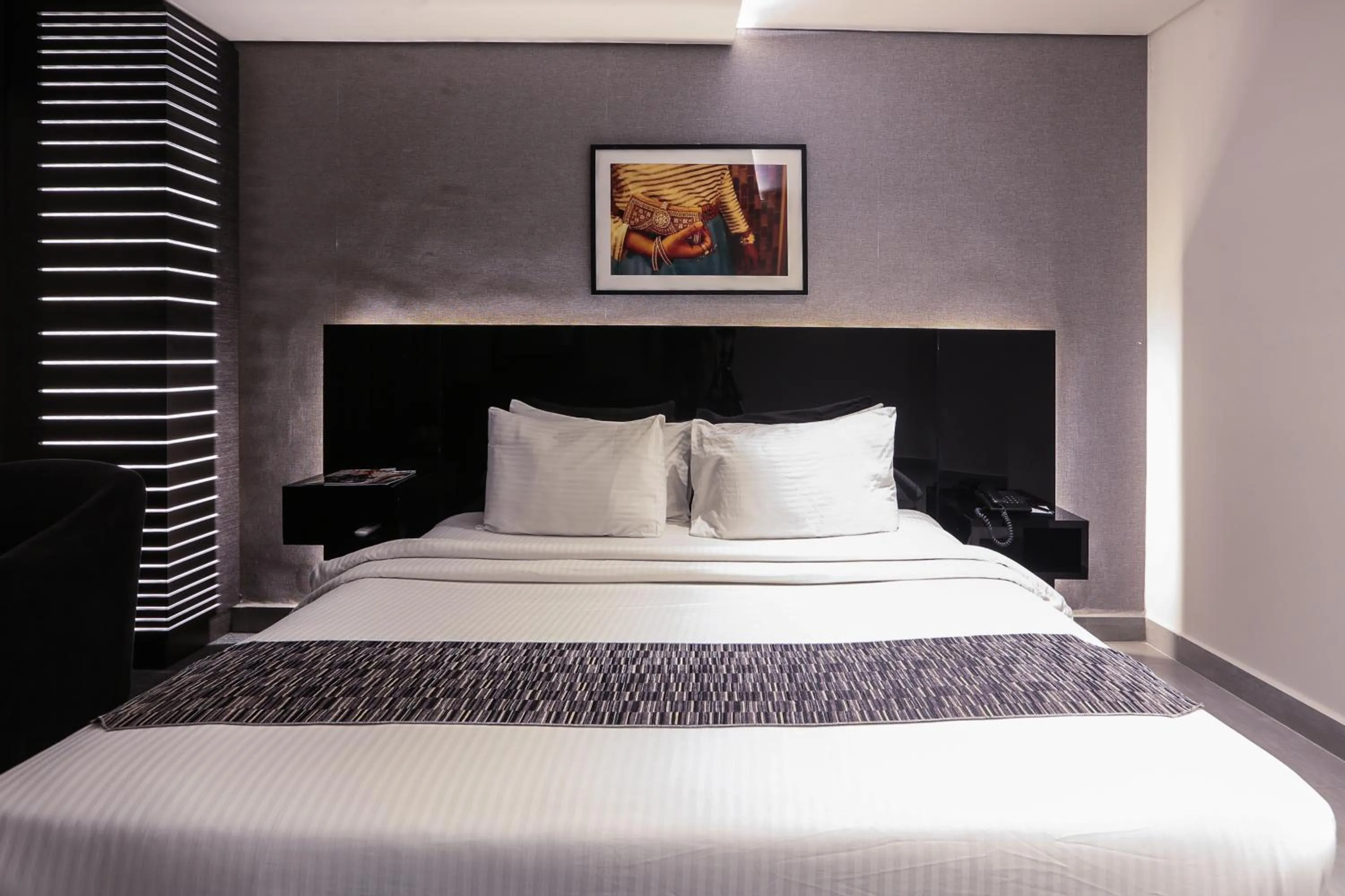 Bed in Khuttar Apartment