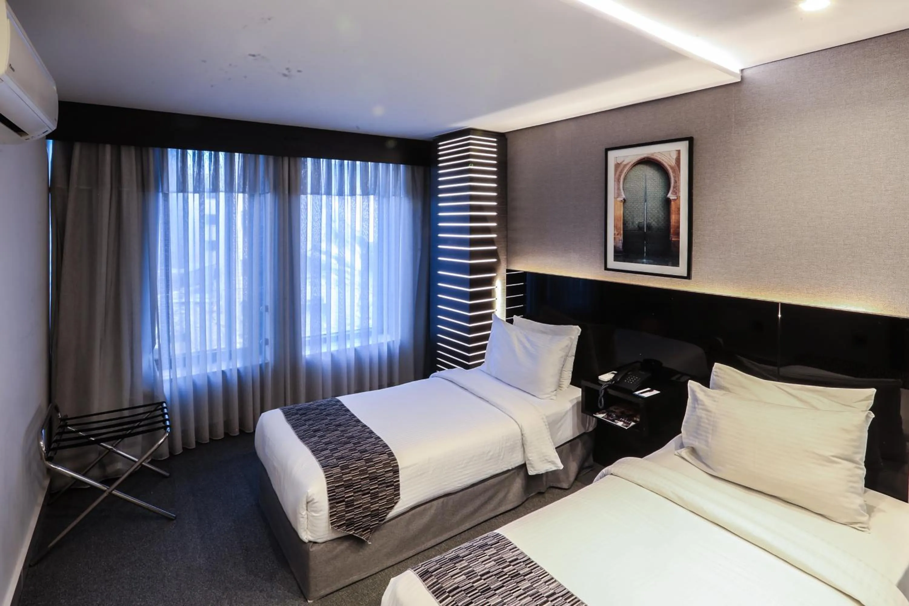 Bed in Khuttar Apartment